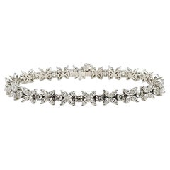 Tiffany & Co. Bracelet tennis victorien en platine avec diamants en grappe de 6,01 carats