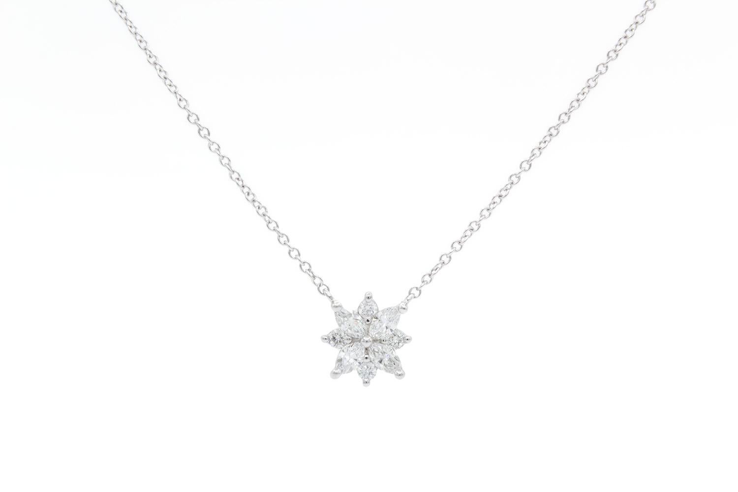 We are pleased to offer this Authentic Tiffany & Co. Victoria Cluster Platinum & Diamond Pendant Necklace. This gorgeous diamond pendant necklace features the classic Tiffany Victoria styling with a twist! The necklace measures 16.5