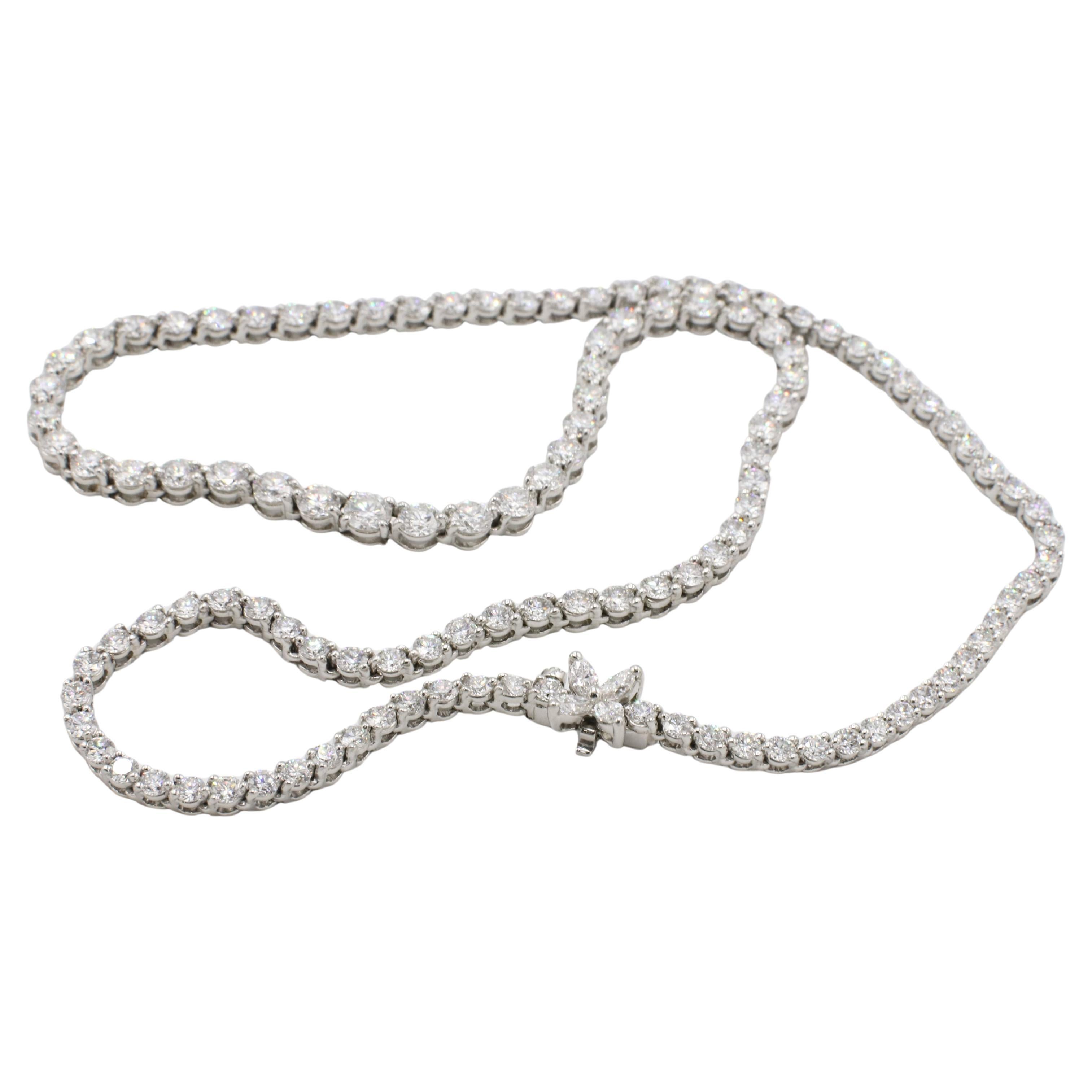 Tiffany & Co. Collana Tennis Line con diamanti naturali graduati Collection'S
Metallo: Platino
Peso: 31.3 grammi
Lunghezza: 16,25 pollici
Larghezza: 2-4 mm
Diamanti: Circa 11 ctw di diamanti naturali rotondi e marquise D-F VVS 
Vendita al dettaglio:
