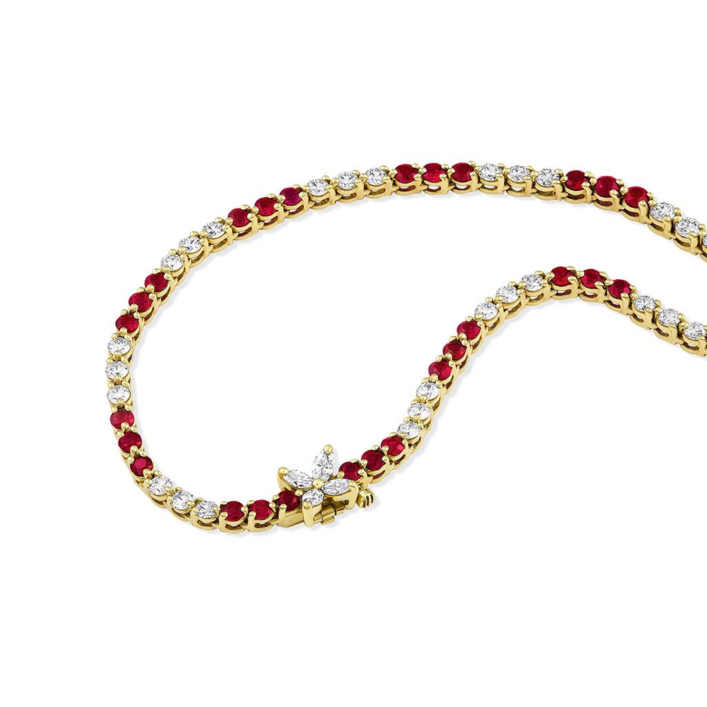 Estate Tiffany Victoria Collection Ruby Diamond Necklace. Tiffany & Co. graduated ruby, diamond and 18k yellow gold necklace from the Victoria Collection. There are approximately 6.75cts of round faceted rubies and approximately 5.7cttw of round