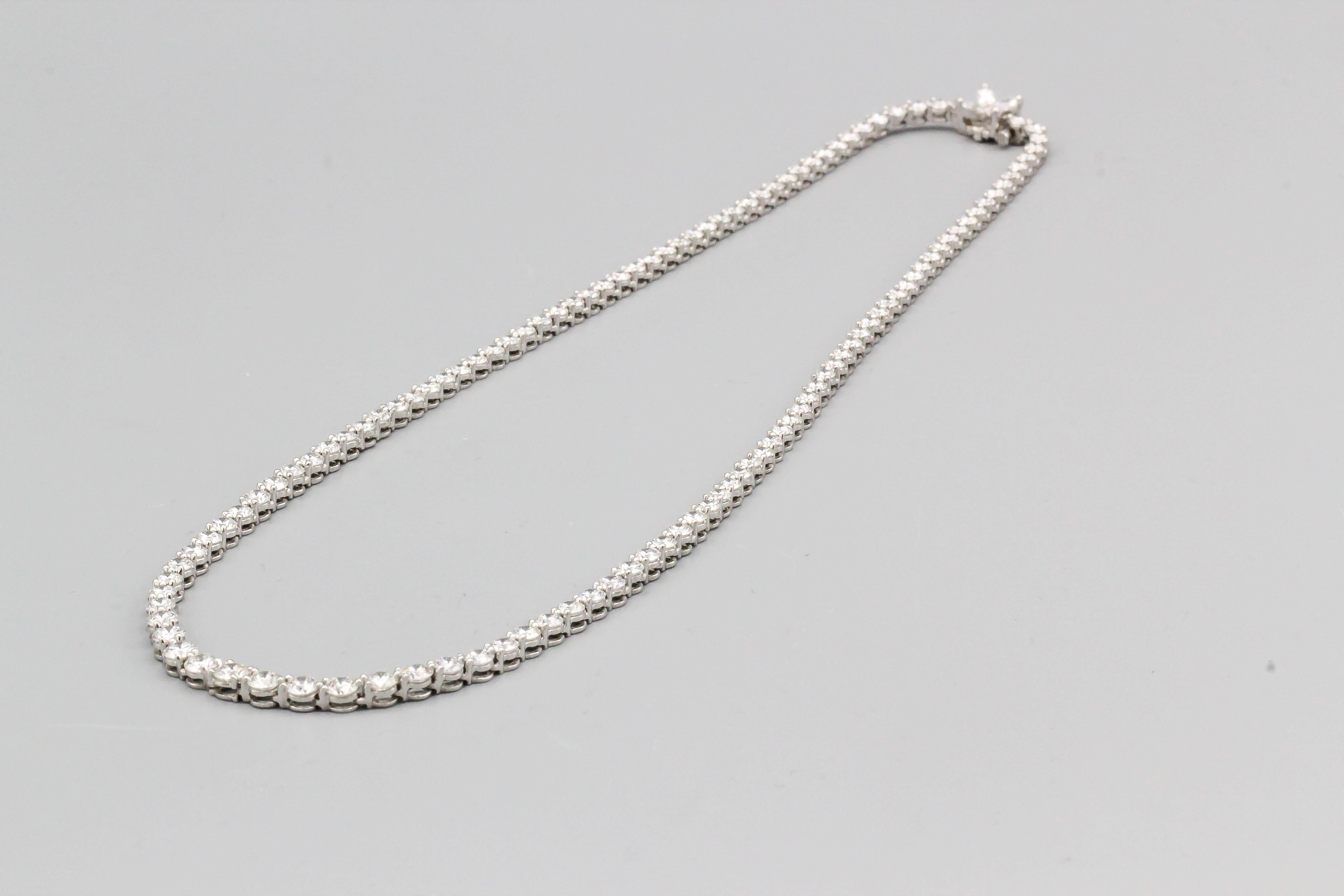 Elegant graduated line necklace of diamonds and set in platinum, from the 