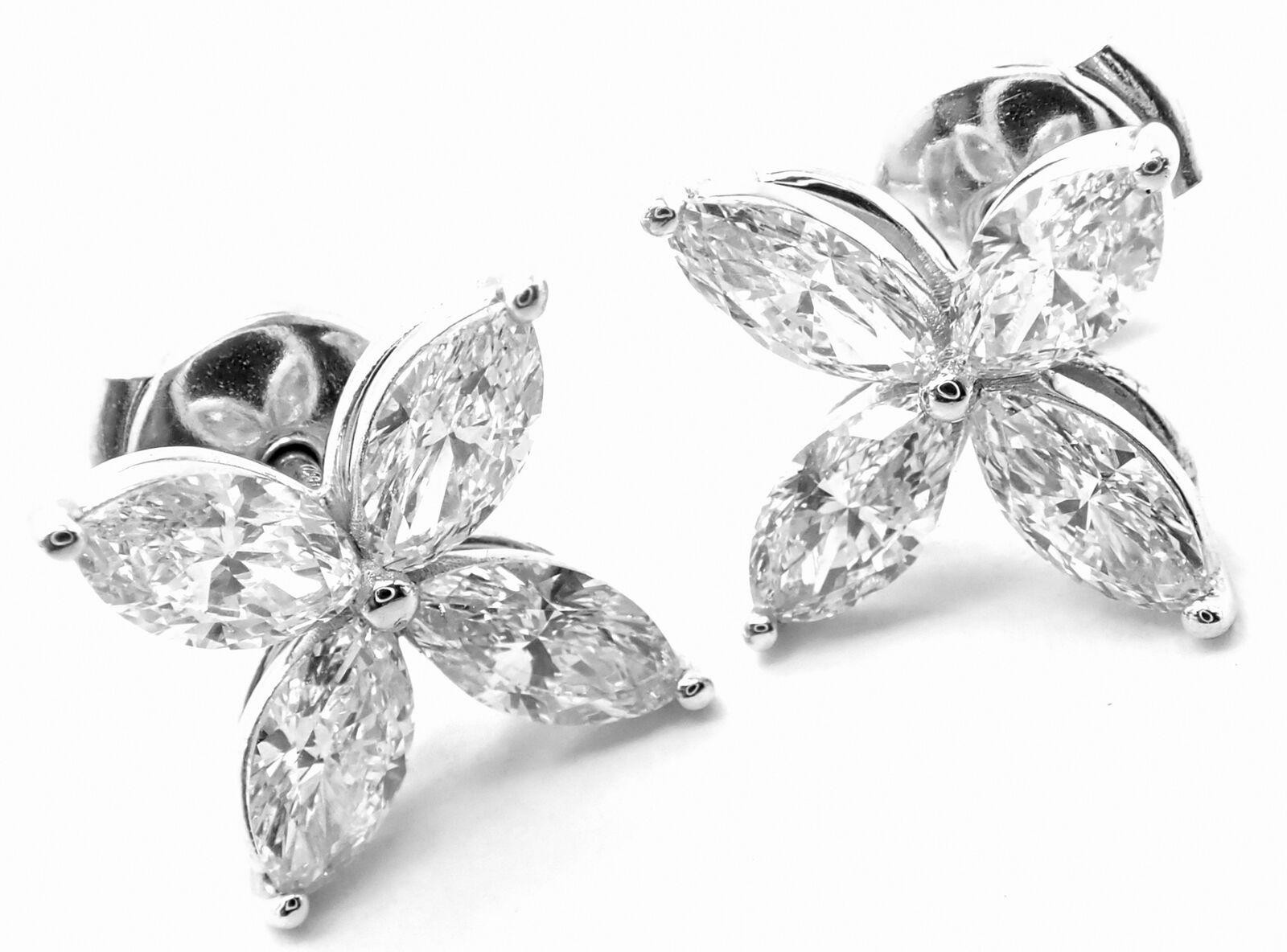 Platinum Victoria Diamond  Earrings by Tiffany & Co. 
With 8 round brilliant cut diamonds - VS1 clarity, E color total weight approximately 1.62ct
These earrings come with original Tiffany & Co box.
Details: 
Weight: 4.6 grams
Measurements: 10mm x
