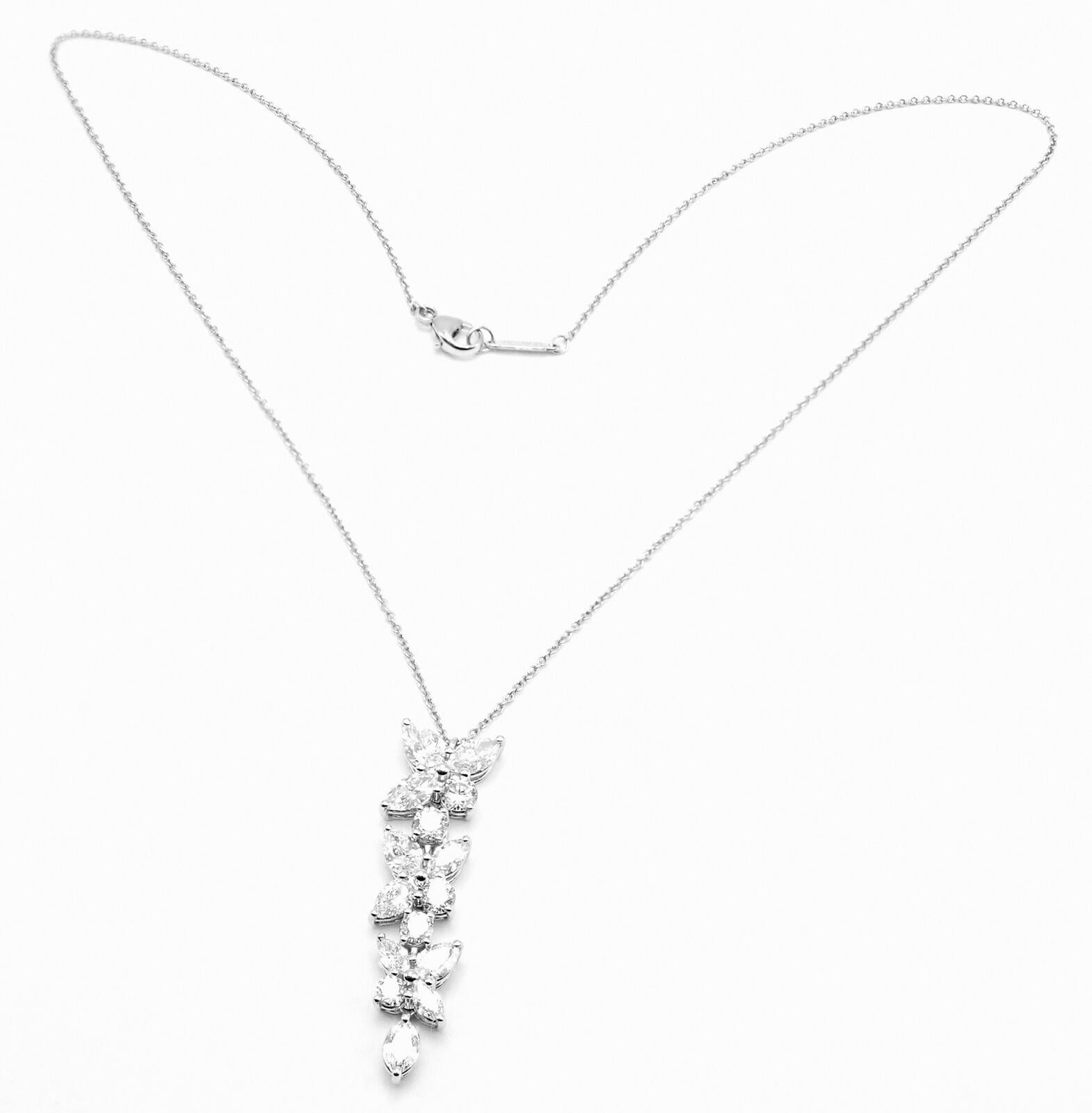 Platinum Victoria Diamond Mixed Cluster Drop Pendant Necklace by Tiffany & Co. 
With Marque shape diamonds VS1 clarity, E color total weight approximately .83ct
Pear shape diamonds VS1 clarity, E color total weight approximately .74ct
Round