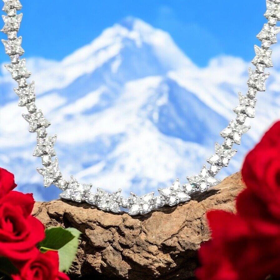 Platinum Diamond Victoria Mixed Cluster Necklace by Tiffany & Co. 
Tiffany & Co’s Victoria Platinum Diamond Mixed Cluster Necklace exudes timeless elegance with 15.83 carats of lustrous diamonds. 
Intricately set in platinum, its floral-inspired