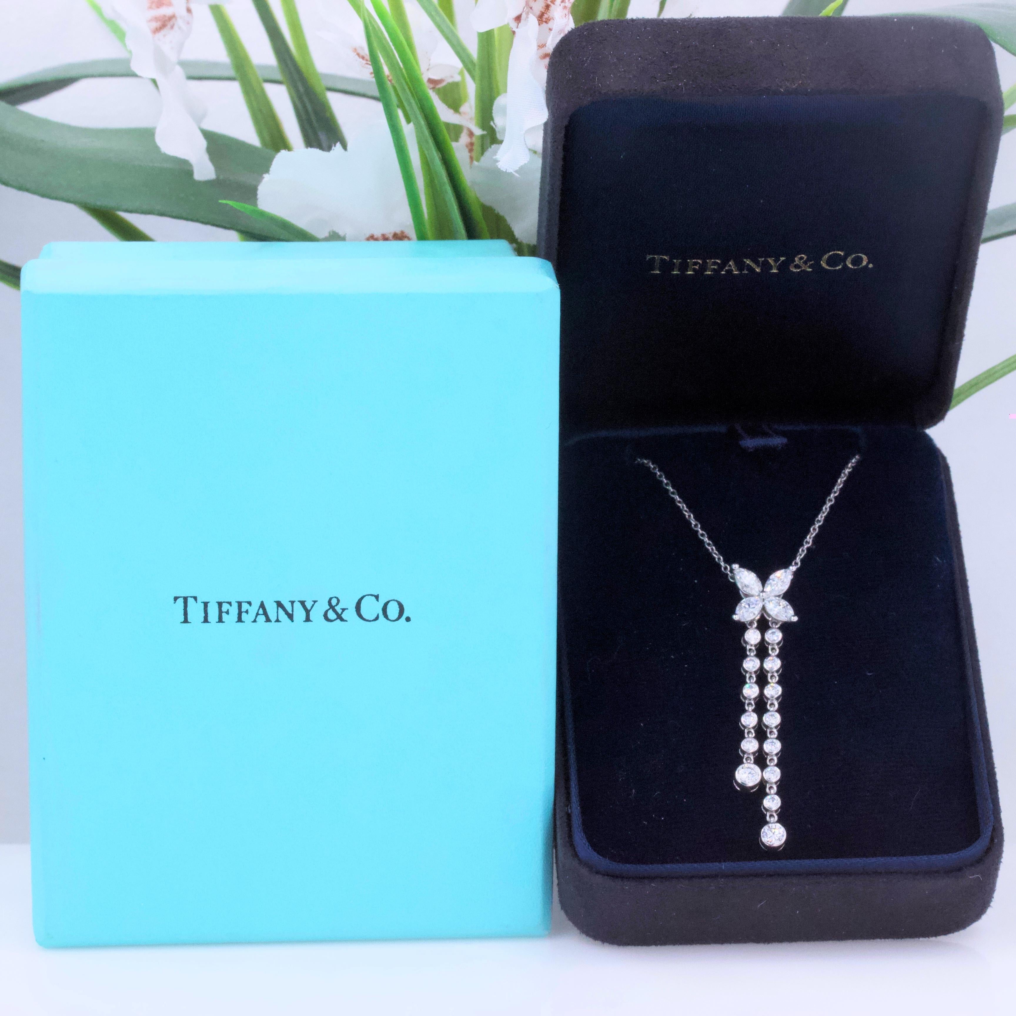Tiffany & Co.
Style:  Victoria Double Drop Pendant Necklace
Metal:  Platinum PT950
Size:  16 Inches
Pendant:  1.6 Inches
Width:  9 MM / 0.35 Inches
Total Carat Weight:  0.91 Tcw
Diamond Shape:  Round Brilliant 0.45 Tcw & Marquise 0.45 Tcw
Diamond
