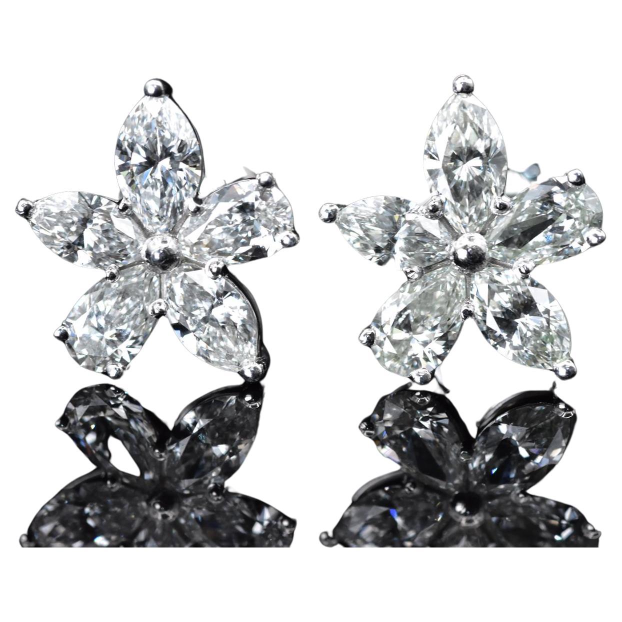 Tiffany CO Victoria Mixed Cluster Earrings 
Size : Large 
Marquise Diamonds , carat weight approximately 0.93
Pear shape diamonds, carat weight approximately 0.84 
Platinum with Diamonds 
Stud earrings 
Come within the original packaging 
Retail