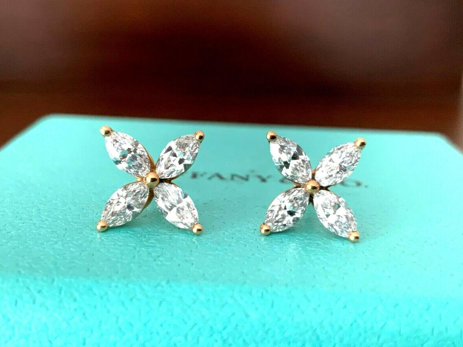 Offered for your consideration is a like new set of 18k Rose Gold Tiffany & Co MEDIUM Sized Victoria earrings.  These are the most popular and stunning set of diamond earrings that Tiffany's sells - especially in ROSE GOLD!

These amazing earrings