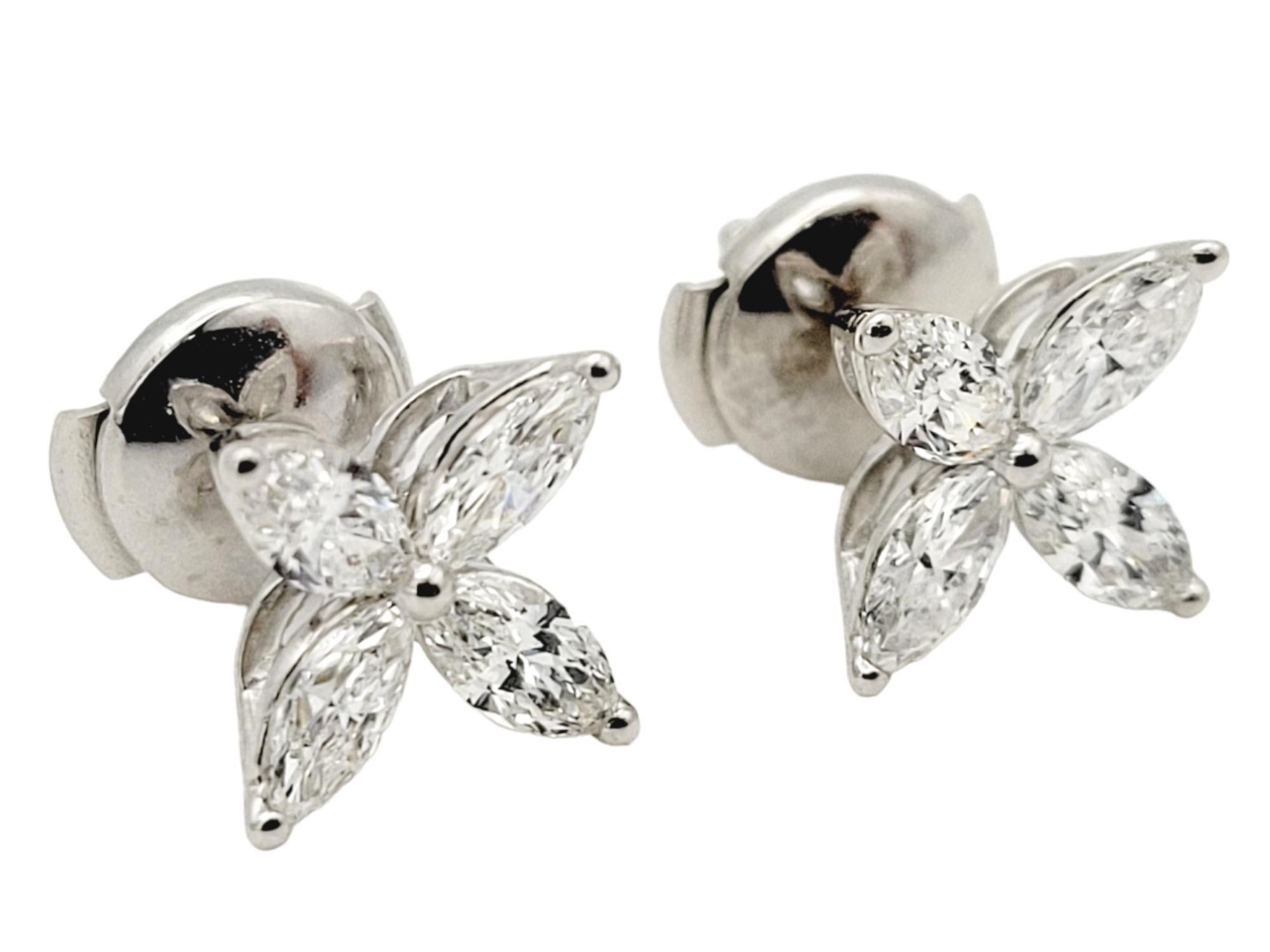 Elevate your look with these exquisite Tiffany & Co. Victoria diamond stud earrings, a true embodiment of timeless elegance and sophistication. Crafted with meticulous attention to detail, these earrings are a testament to the renowned craftsmanship