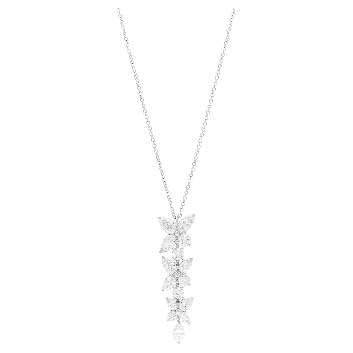 Pre-owned Tiffany & Co. Victora mixed cluster pendant crafted in platinum. The necklace is a playful twist on Tiffany & Co.'s iconic Victoria design featuring a mix of marquise, pear-shaped, and round brilliant cut diamonds of an estimated 2.12