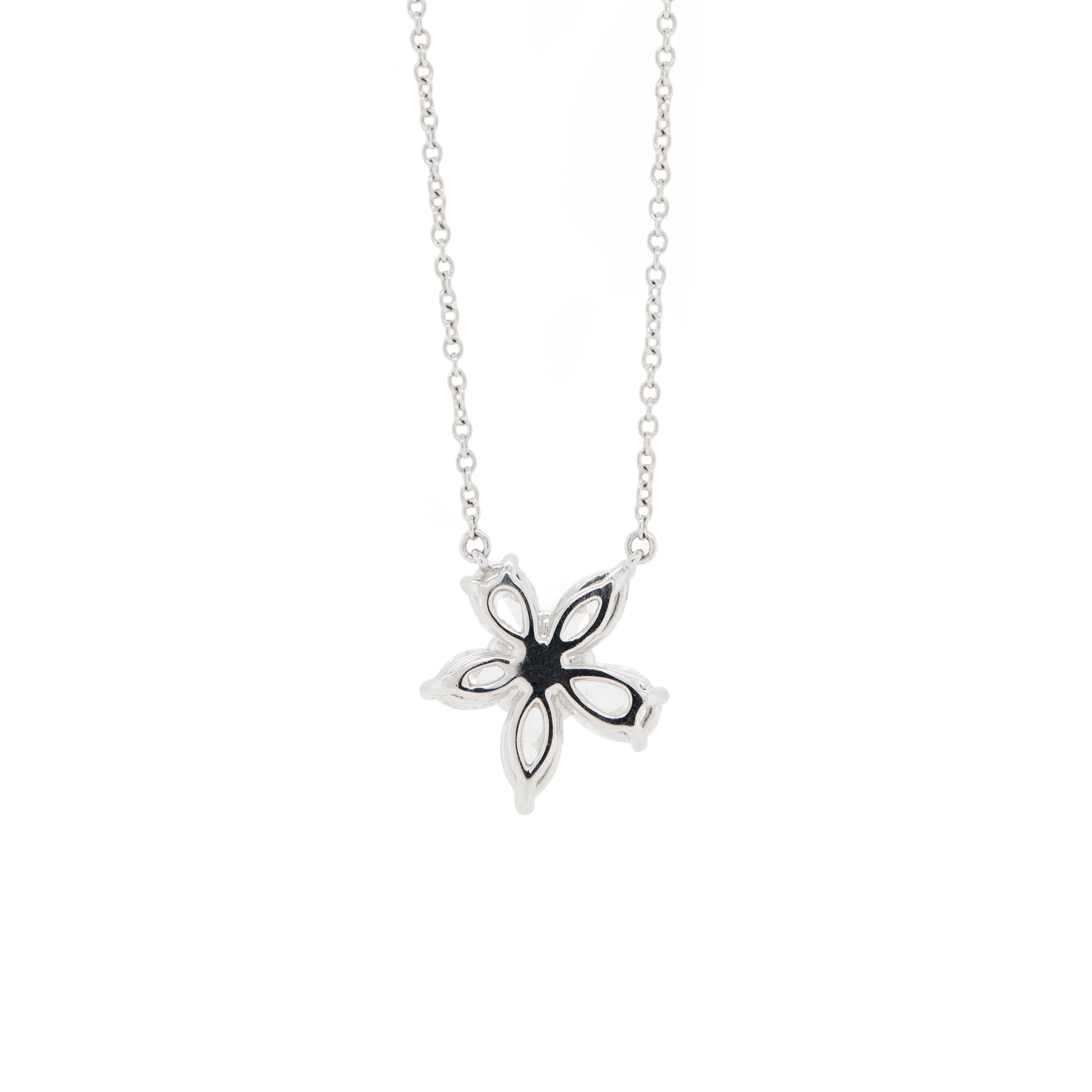 Add a touch of timeless sparkle to your collection with this Tiffany & co Victoria pendant necklace, a current design still available today at Tiffany & Co. 

Crafted in luminous platinum, it features a cluster of marquise-cut (approx. 0.46ct) and