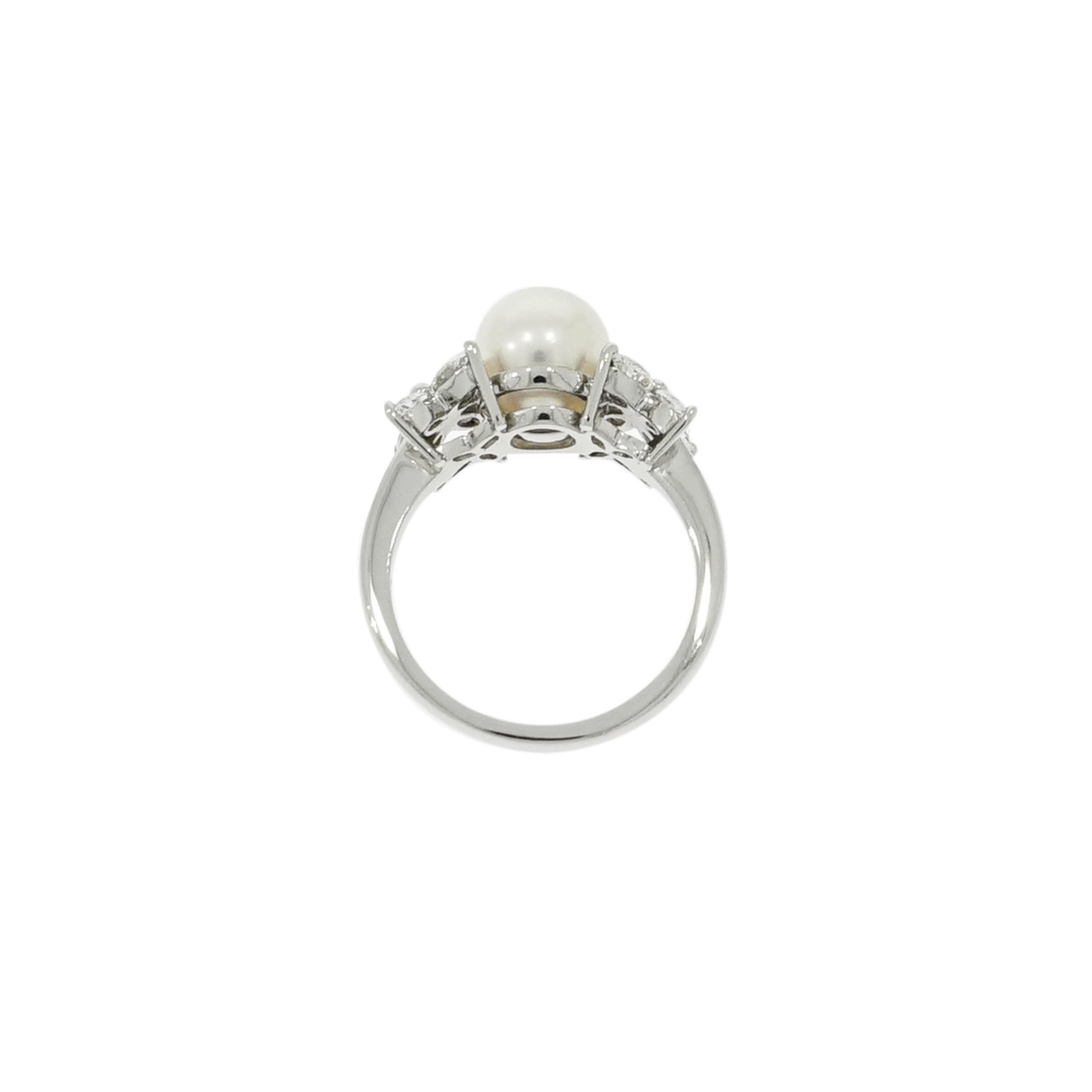 Tiffany Victoria celebrates the blazing brilliance of Tiffany diamonds, paired with a timeless 7.5-8 mm white pearl center. Crafted in Platinum, this classic ring is set to fit a finger size 6. The total weight of diamonds is approximately 0.36