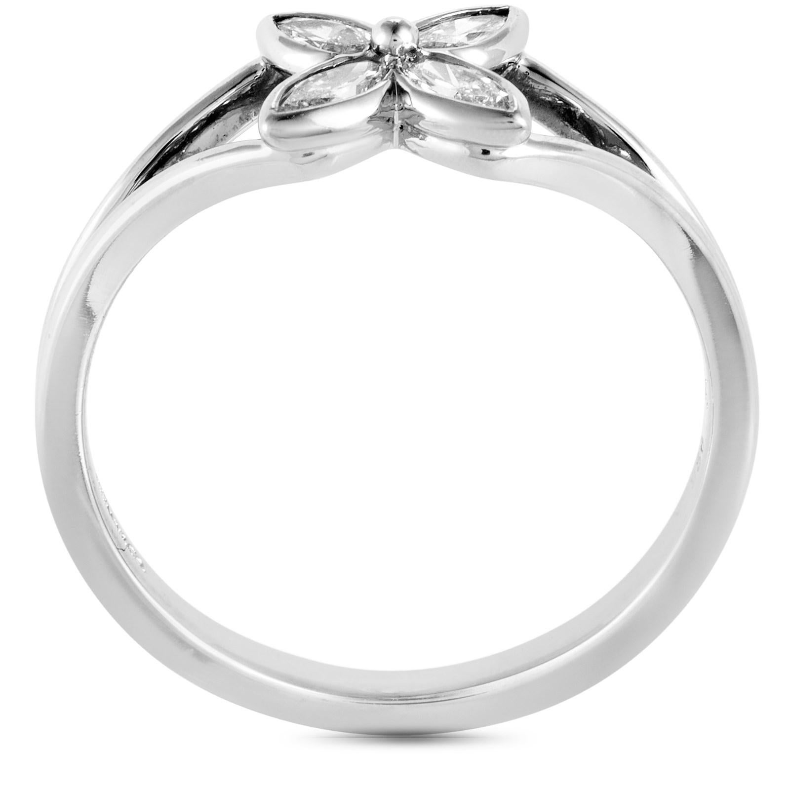 This Tiffany & Co. ring from the Victoria collection is made out of platinum and diamonds that total 0.40 carats. The ring weighs 3.3 grams and boasts band thickness of 2 mm and top height of 3 mm, while top dimensions measure 7 by 7 mm.

Offered in