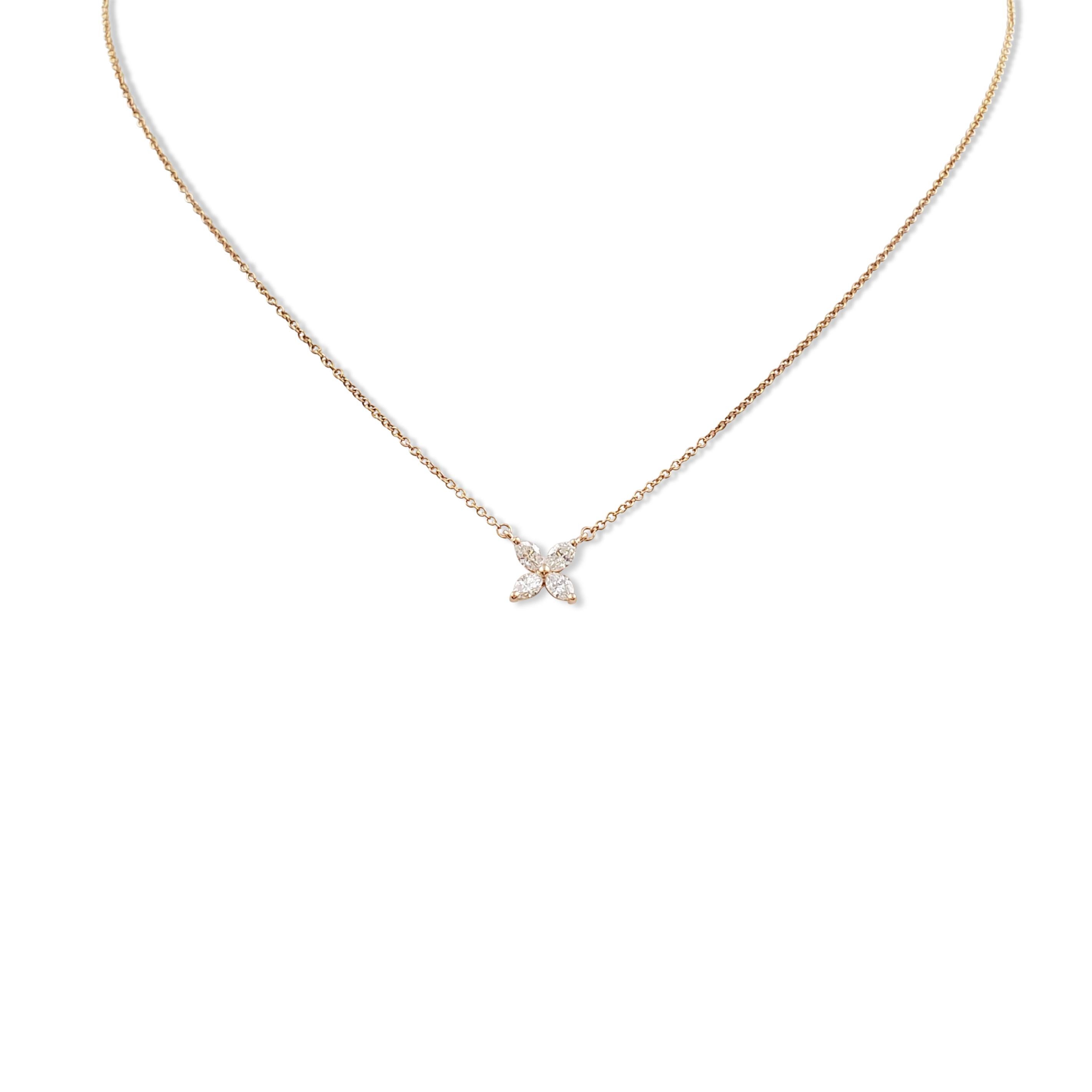 Authentic Tiffany & Co. 'Victoria' pendant necklace crafted in 18 karat rose gold and set with an estimated 0.24 carats of marquise-cut diamonds (E-F color, VS clarity). Signed Tiffany & Co., Au750. The necklace measures 16 inches in length.