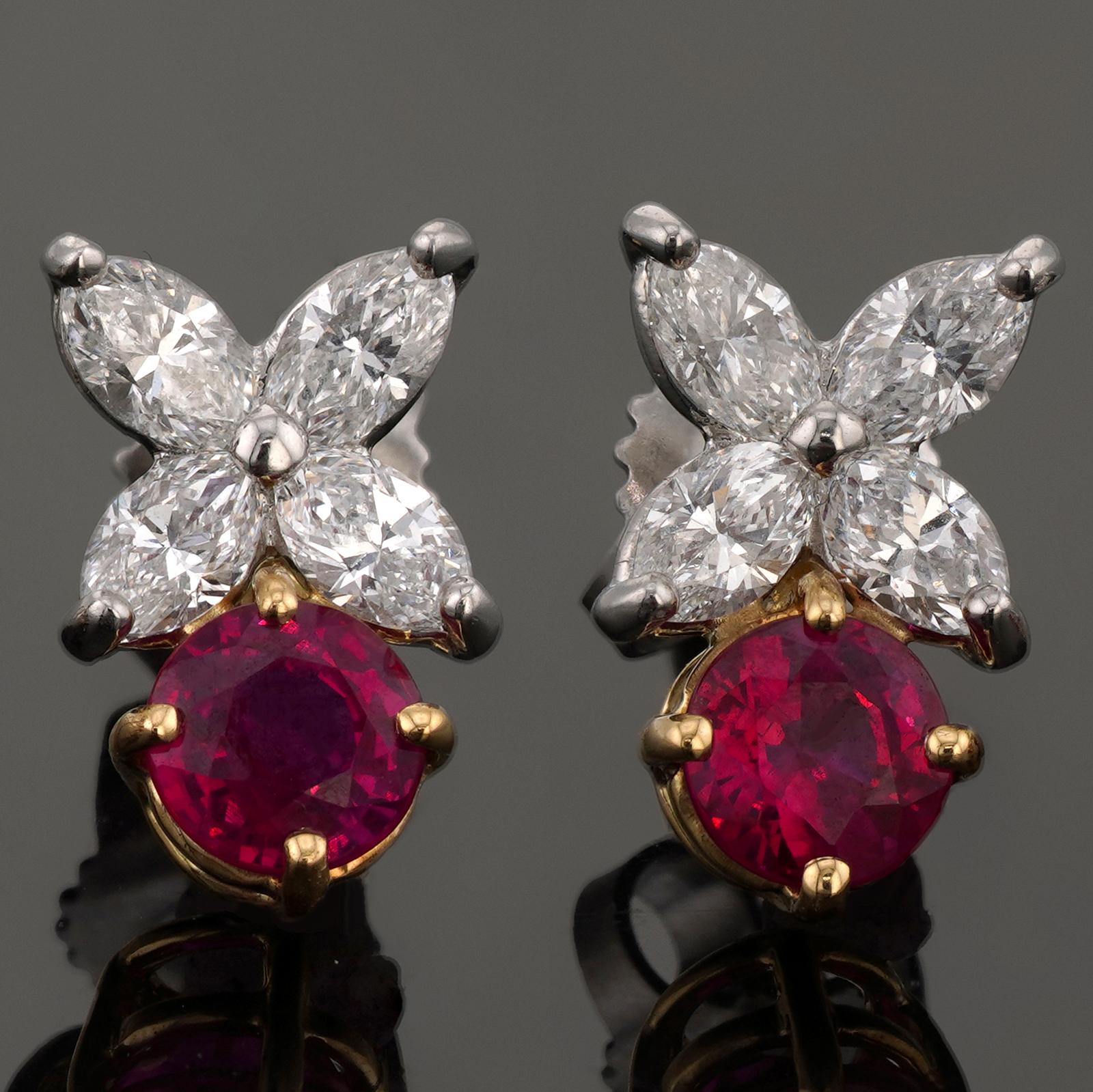 These gorgeous Tiffany & Co. earrings from the exquisite Victoria Collection are crafted in platinum and set with a round-cut bright red Burma rubies weighing an estimated 1.10 carats and marquise-cut F-G-H VVS2-VS1 brilliant-cut round diamonds