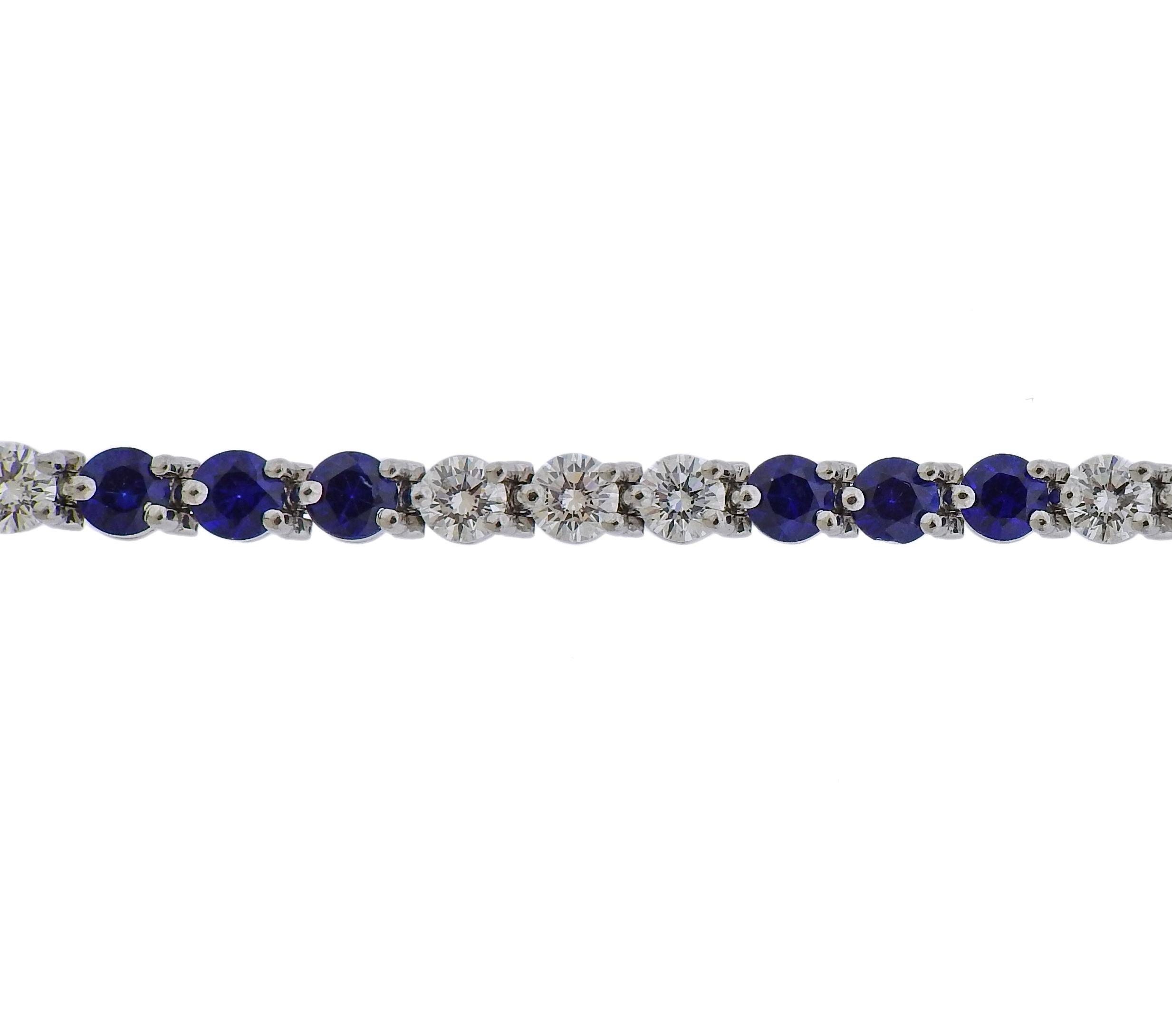 Classic platinum Victoria bracelet by Tiffany & Co, set with approx. 4.15ctw in blue sapphires and 3.24ctw in H/VS diamonds. Bracelet is 6 3/4