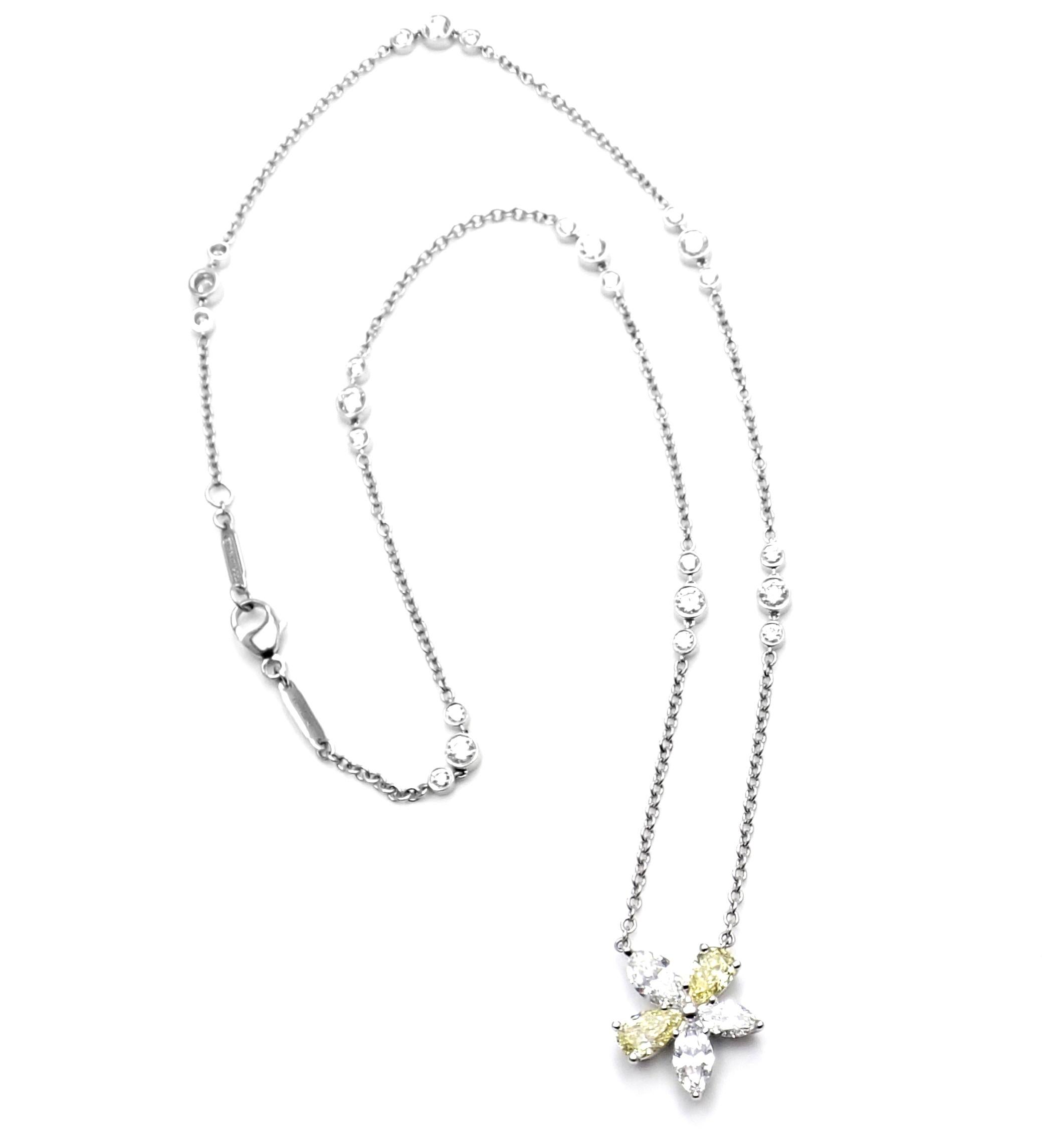 Platinum Victoria Yellow & White Diamond Pendant Necklace by Tiffany & Co. 
With 2 pear shape fancy intense yellow color diamonds total weight approx. .68ct
24 round brilliant cut diamonds Flawless - VS2 clarity and D-G color total weight approx.