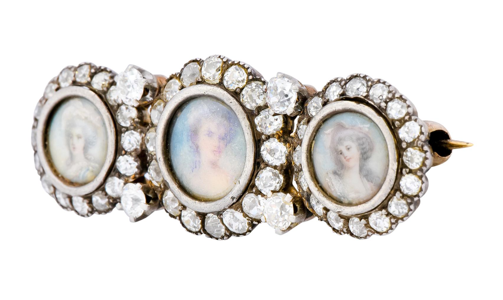 Centering three glass covered, hand painted portraits of women

One with grey curls, a fancy hat, and a blue dress; another with blonde updo and exposed shoulders; and one with large grey curls and white floral Victorian bonnet, all against a blue