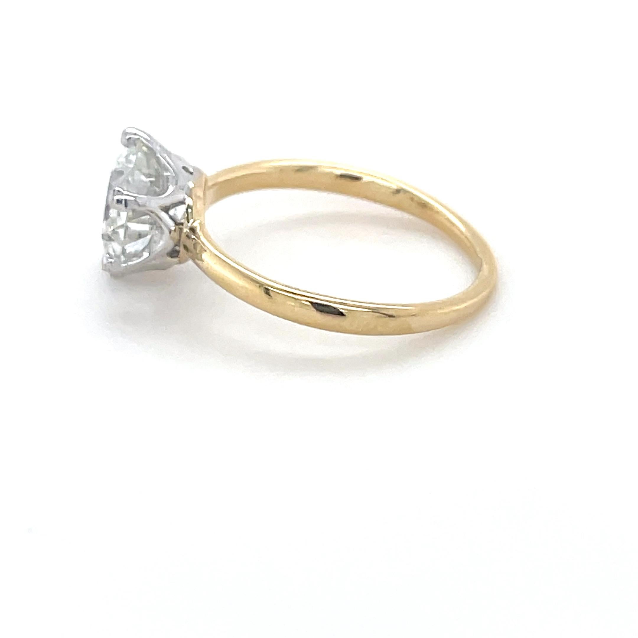 This Victorian diamond engagement ring designed by Tiffany & Co. boasts a beautiful old European cut diamond, GIA graded G color and VVS2 clarity. Mounted within six prongs, this ring is elegant with a touch of history.

Ring Size: 6 1/4
Stamp: