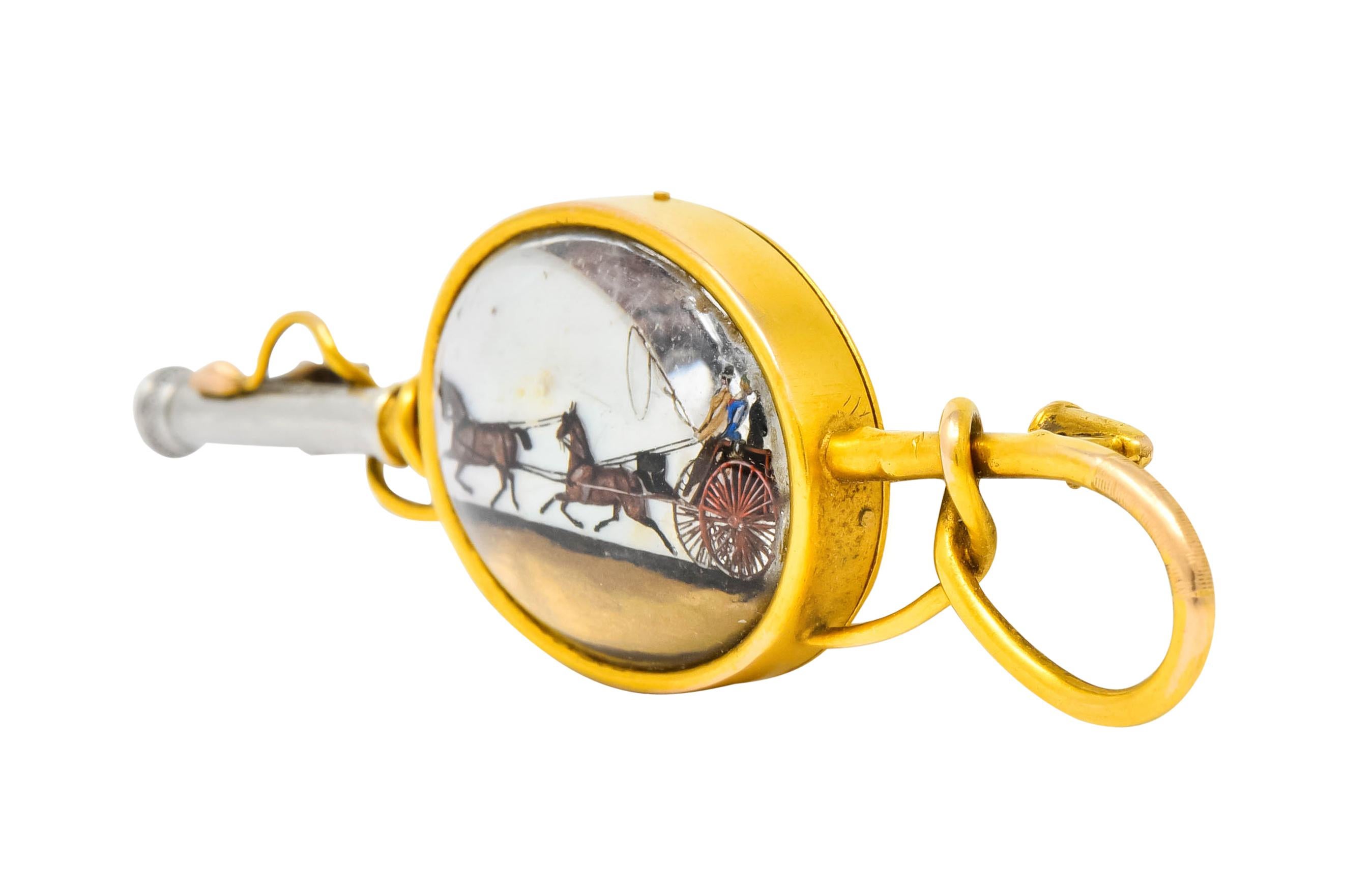 Brooch designed as a riding whip with a winding gold lash and a platinum hilt

Centering an oval rock crystal cabochon measuring approximately 21.5 x 16.5 mm; bezel set in a high polished gold surround

Rock crystal is transparent and backed by