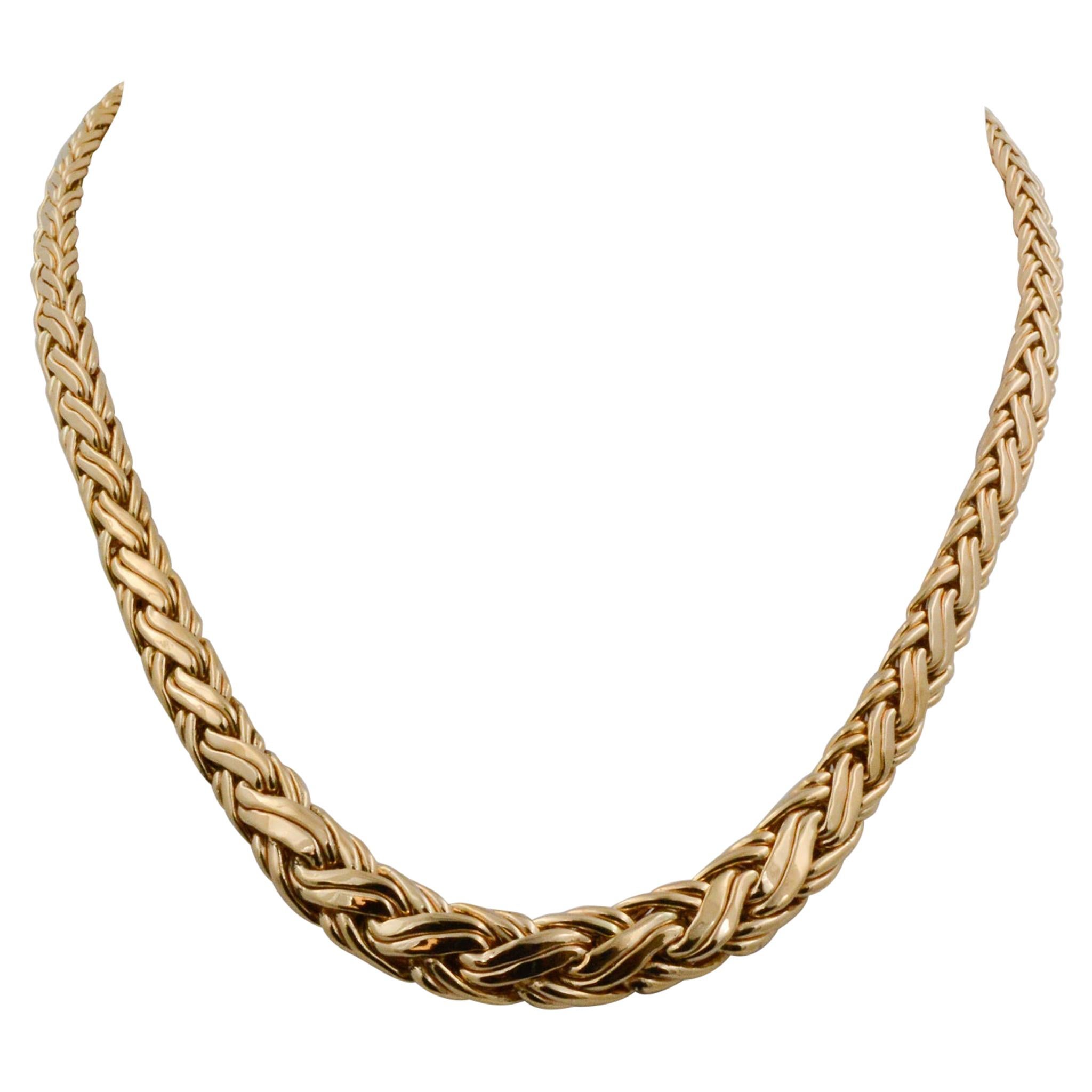 From the 1940s, this Tiffany & Co. necklace is fashioned in 14k yellow gold. The necklace has a Byzantine pattern with a graduated design on a 16