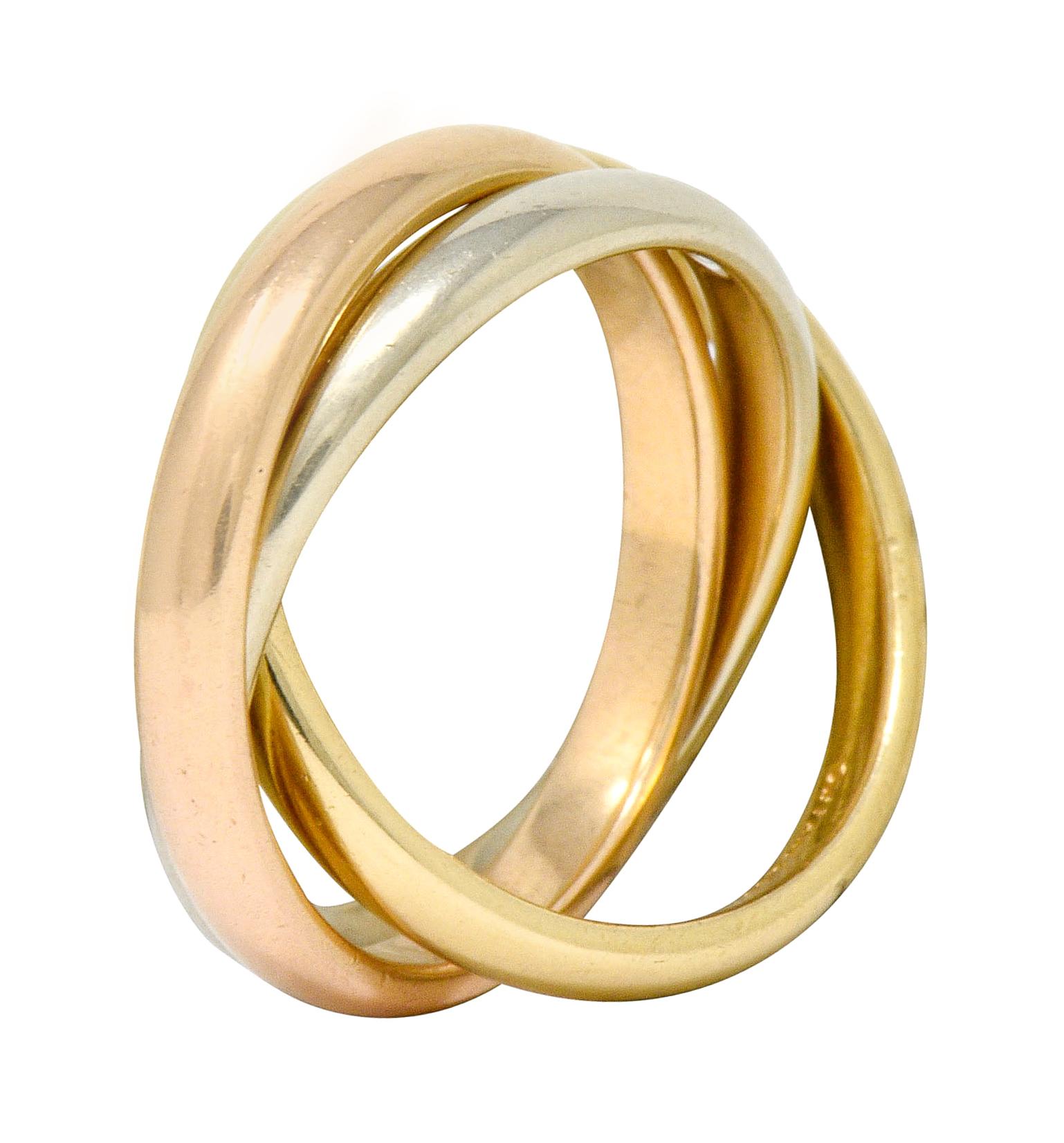 Tiffany & Co. Vintage 14 Karat Tri-Colored Gold Paloma Melody Rolling Band Ring In Excellent Condition In Philadelphia, PA