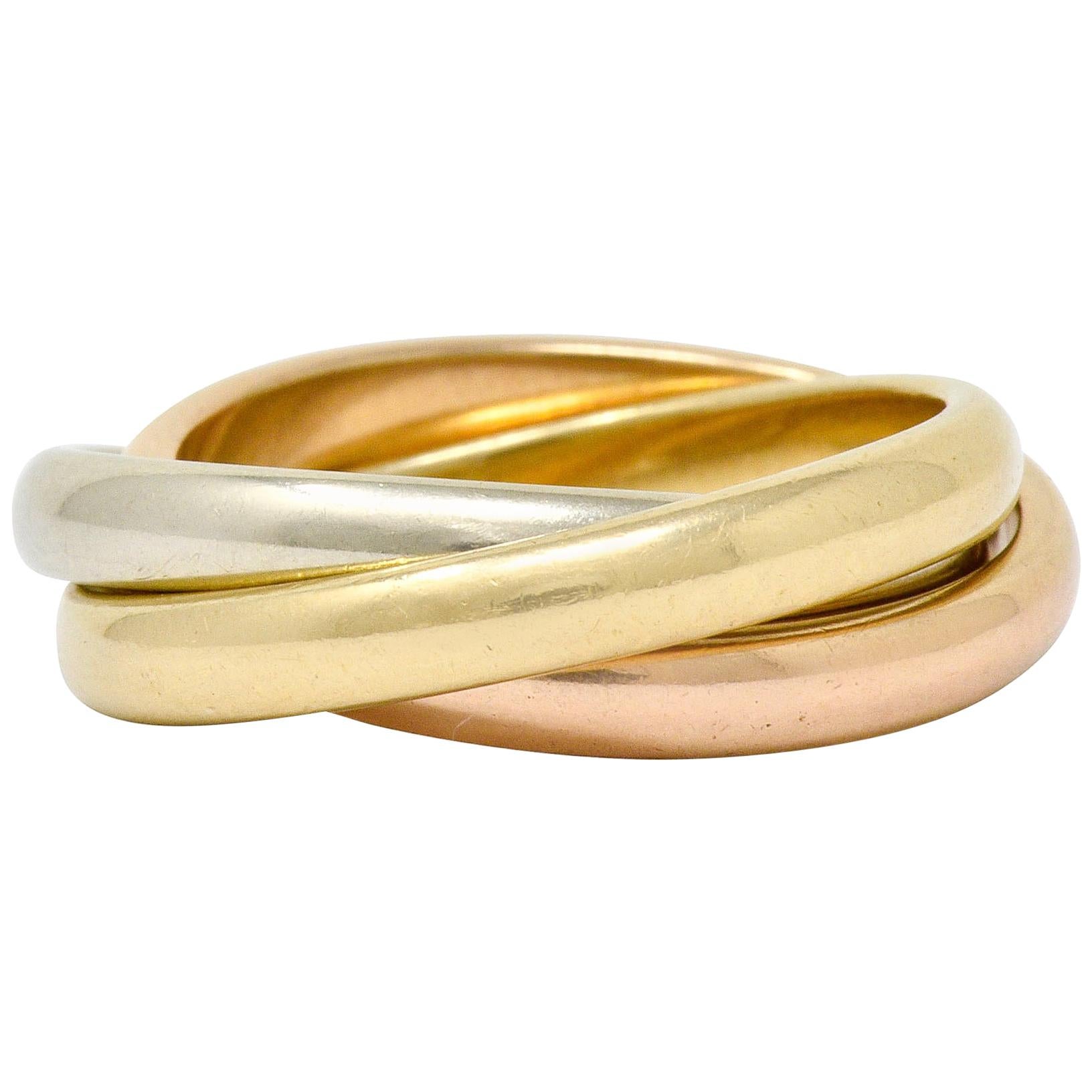 Tiffany and Co. Vintage 14 Karat Tri-Colored Gold Paloma Melody Rolling  Band Ring at 1stDibs | tiffany rolling ring, paloma melody ring, tiffany  tricolor ring