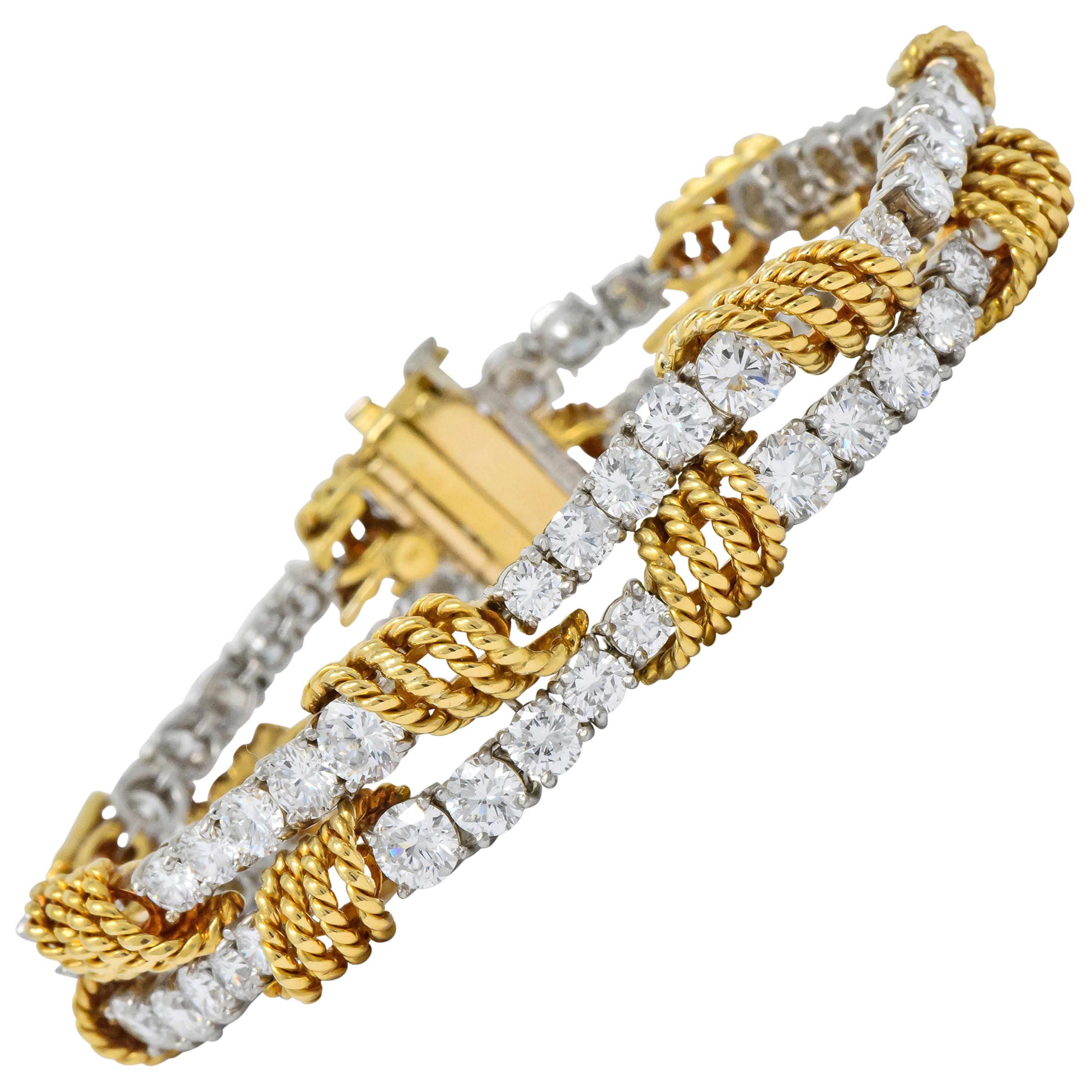 Featuring two rows of basket set, round brilliant cut diamonds weighing approximately 14.00 carats total, G/H color and VVS clarity

Diamonds set in platinum, graduating in size with wrapped twisted gold rope detail

Completed by a concealed clasp