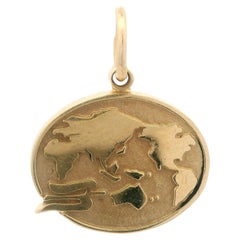 Tiffany & Co. Colgante vintage de oro amarillo de 14k con doble acabado de mapa del mundo