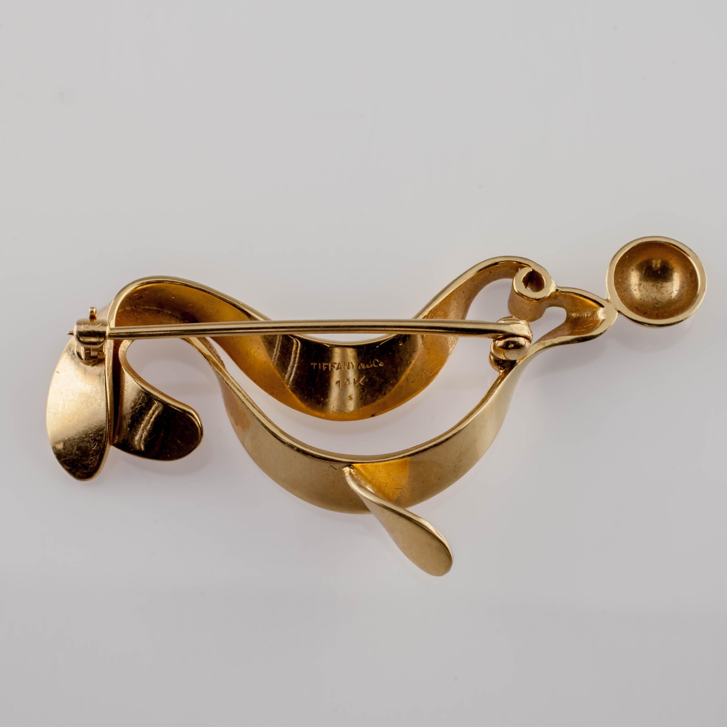 Gorgeous Stylized Ribbon Brooch by Tiffany & Co.
Sea Lion Balancing a Ball
Width of Brooch (Distance Across) = 48 mm
Length of Brooch (Distance from top of head to pectoral fin) = 24 mm
Total Mass = 6.3 grams