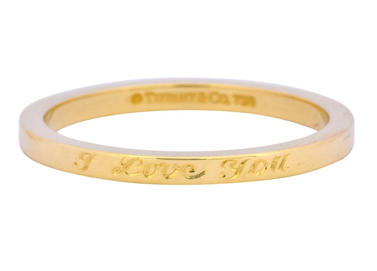 Thin stacking band ring designed as straight parallel edges and a high polished finish

Deeply engraved to front with 