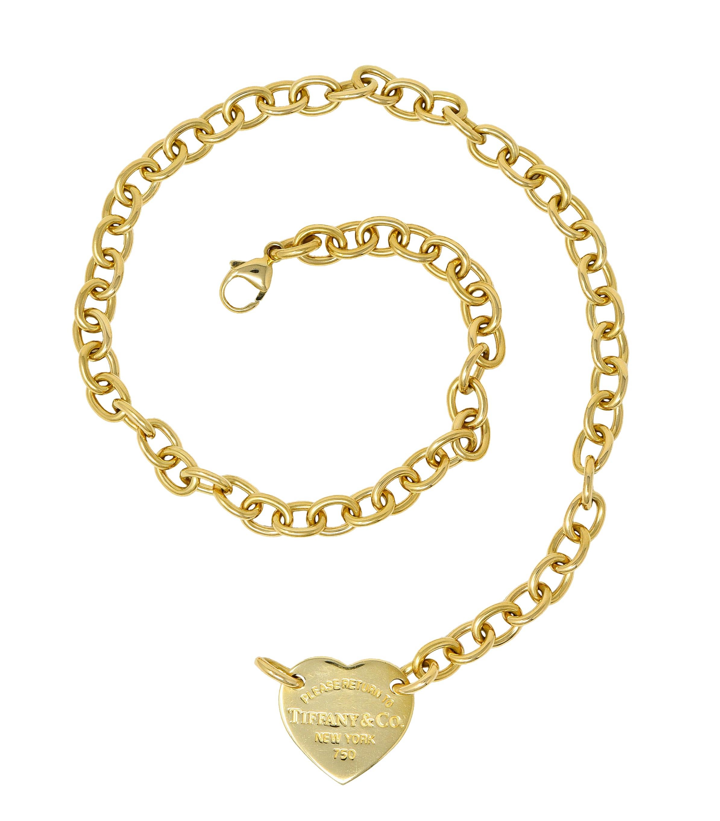 Collar style necklace is comprised of brightly polished oval links

Centering the classic 'Please Return to Tiffany & Co.' heart

Completed by a lobster clasp

Stamped 750 for 18 karat gold

Fully signed Tiffany & Co.

Circa: 1990s

Length: 15 3/8