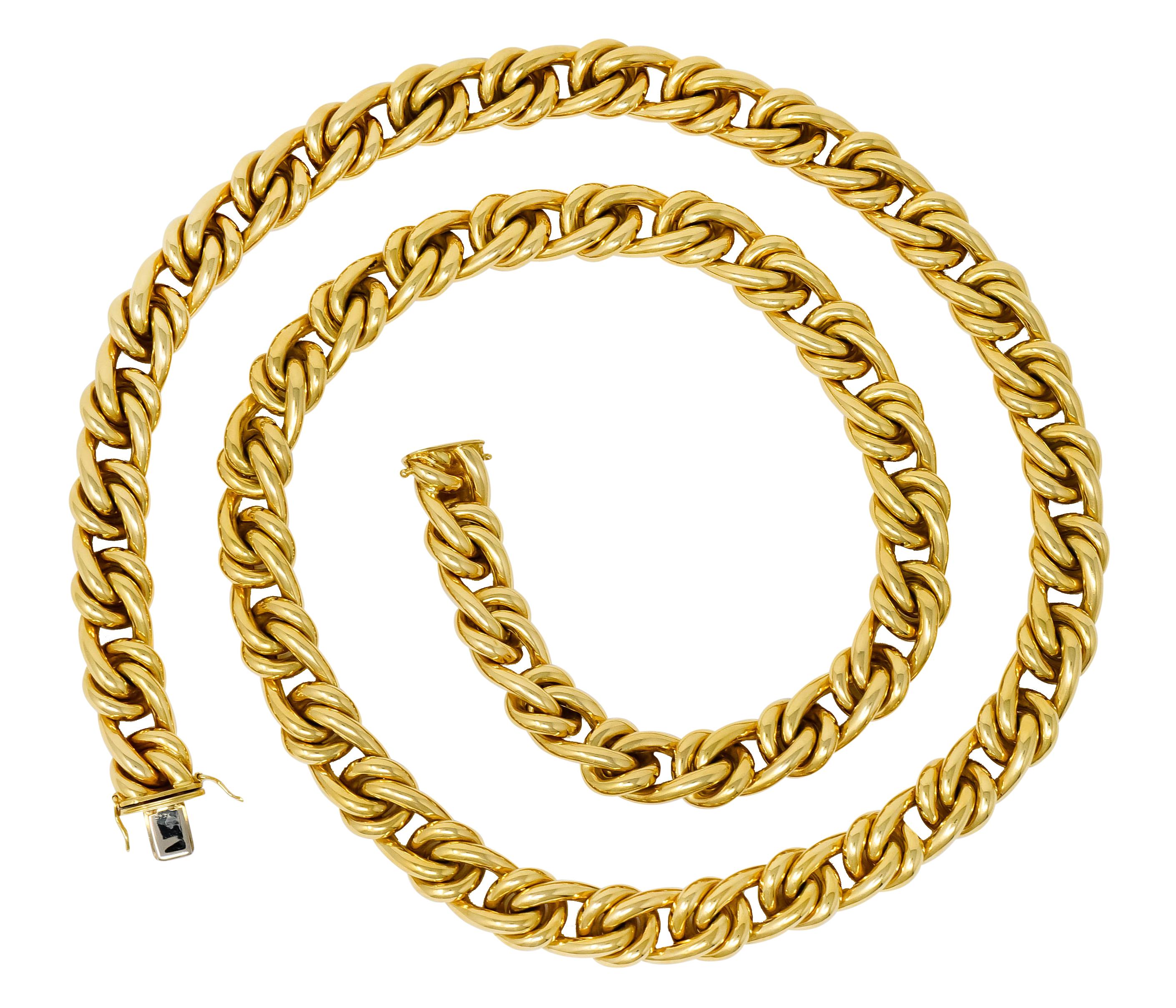Large continuous chain necklace comprised of round links alternating with ribbed spacer links

Featuring a bright polished finish

Fully signed Tiffany & Co.

Stamped 750 for 18 karat gold

Circa: 1980s

Length: approx. 37 inches

Width: 1/2