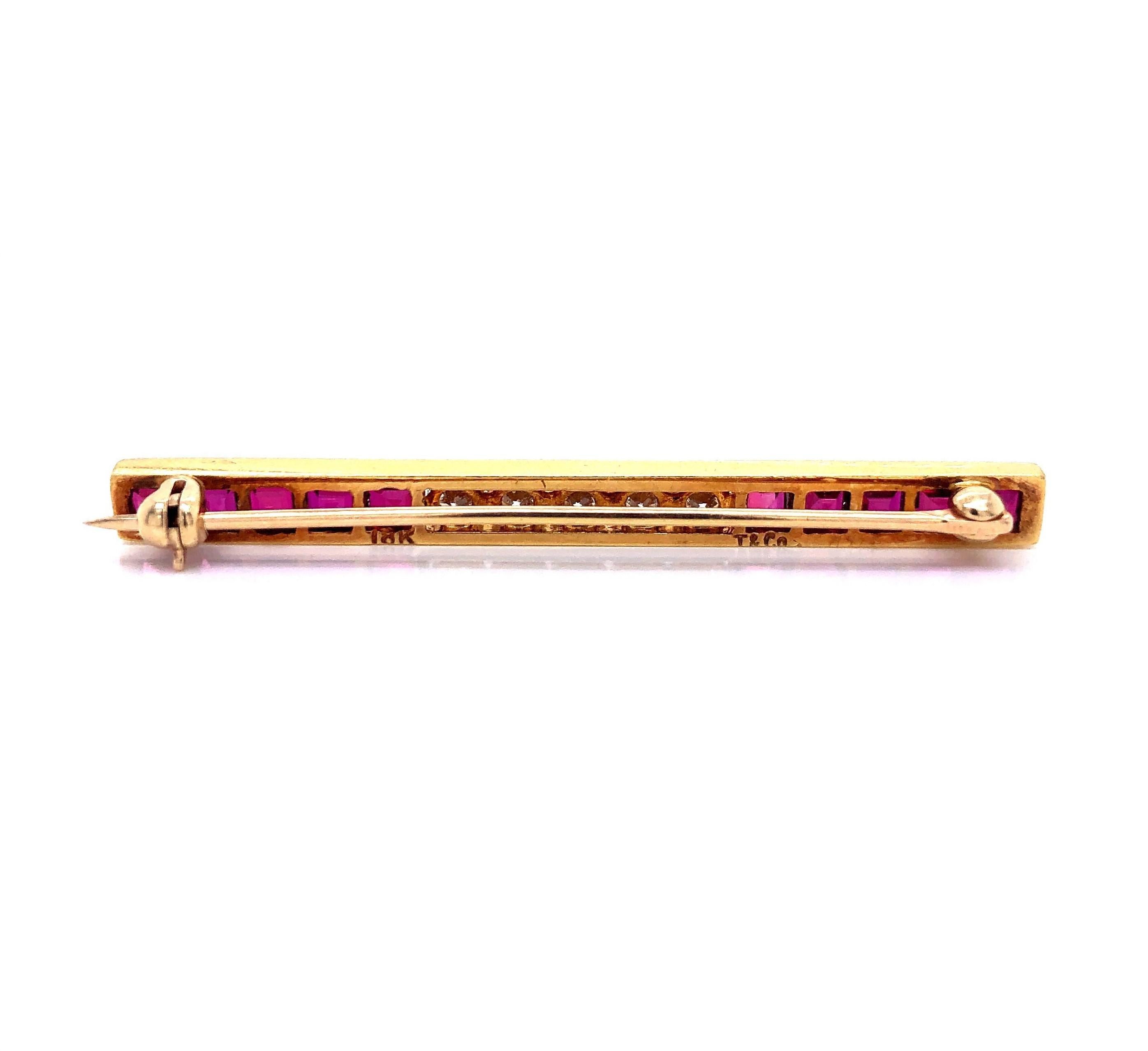 Tiffany & Co. Vintage 18k Yellow Gold Ruby and .50cttw Diamond Bar Brooch

Condition:  Excellent Condition
Metal:  18k Gold (Marked, and Professionally Tested)
Gemstones:  Natural Bright Red Princess Cut Rubies 2cttw
Diamonds:  Round Brilliant