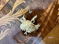 TIFFANY & CO. Broche Oiseau Vintage en or jaune 18k et saphir Vintage