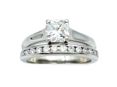 Tiffany & Co. .66 Carat Lucida Solitaire Engagement Ring and Diamond Band Set