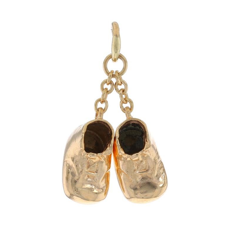 Brand: Tiffany & Co.
Era: Vintage

Metal Content: 14k Yellow Gold

Theme: Baby Shoes, Infant Walkers, First Steps

Measurements
Tall (from extended bail joining chains): 7/8