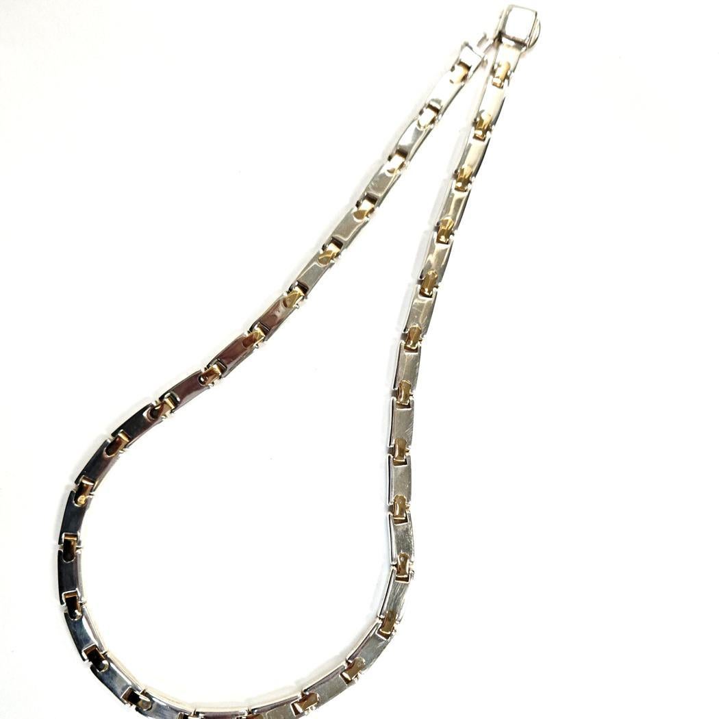 Tiffany & Co. Collana vintage A Link - Oro giallo 18 carati e argento sterling, 45 g, circa anni '80

Questa autentica collana vintage di Tiffany & Co. esemplifica la raffinatezza senza tempo dei modelli bicolore della casa. Realizzato in argento