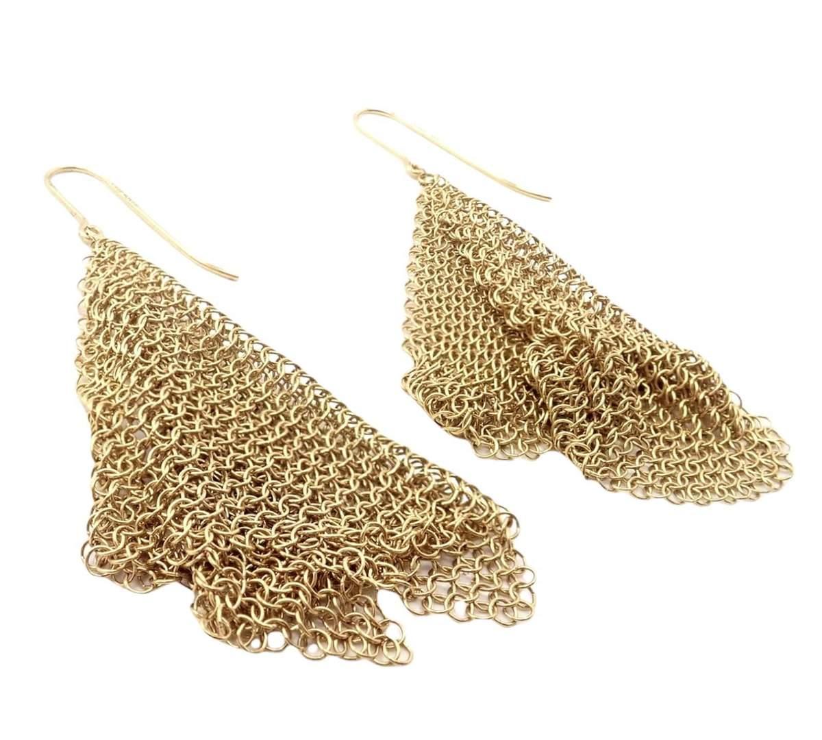 Vintage Tiffany & Co. Elsa Peretti 18k Yellow Gold Mesh Dangle Earrings. 

Metal: 18k Yellow Gold
Size: 60mm x 12mm
Weight: 7.1 grams
Style: Elsa Peretti
Stamped Hallmarks: T & Co 750
*Free Shipping within the United States
YOUR PRICE: $2,250
JW7aahx