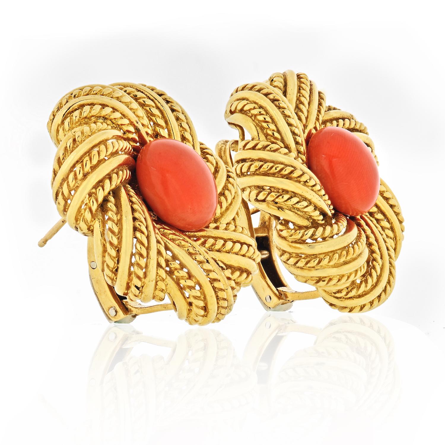 Beautiful vintage earrings by Tiffany & Co crafted in 1970's set with cabochon orange coral and look beautiful today as they did half a century ago. 
For pierced ears.
