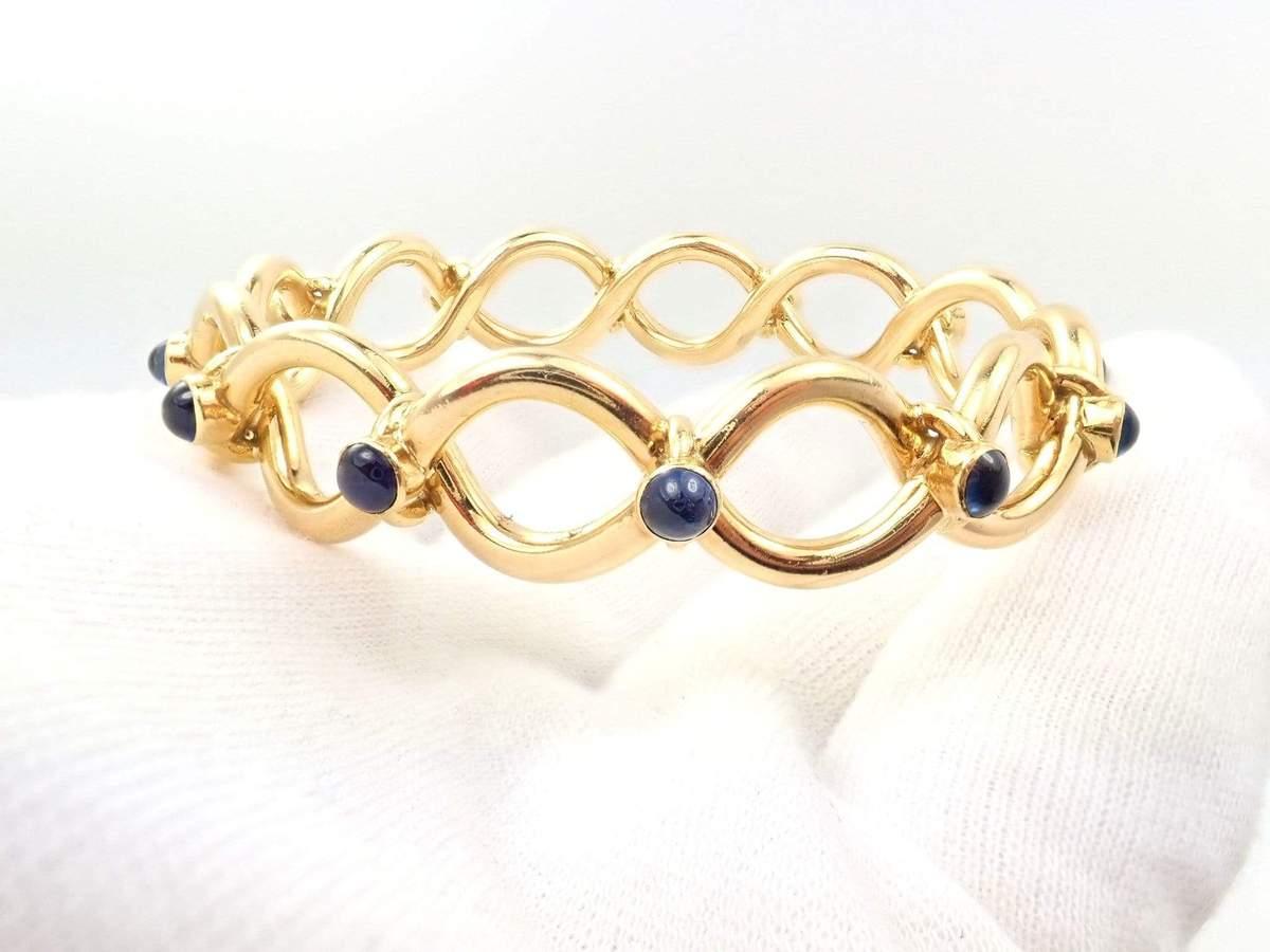 Taille brillant Tiffany & Co. Bracelet jonc vintage français en or jaune et saphirs bleus en vente