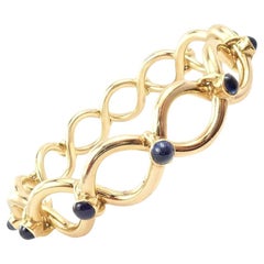 Tiffany & Co. Vintage France Yellow Gold Blue Sapphire Bangle Bracelet
