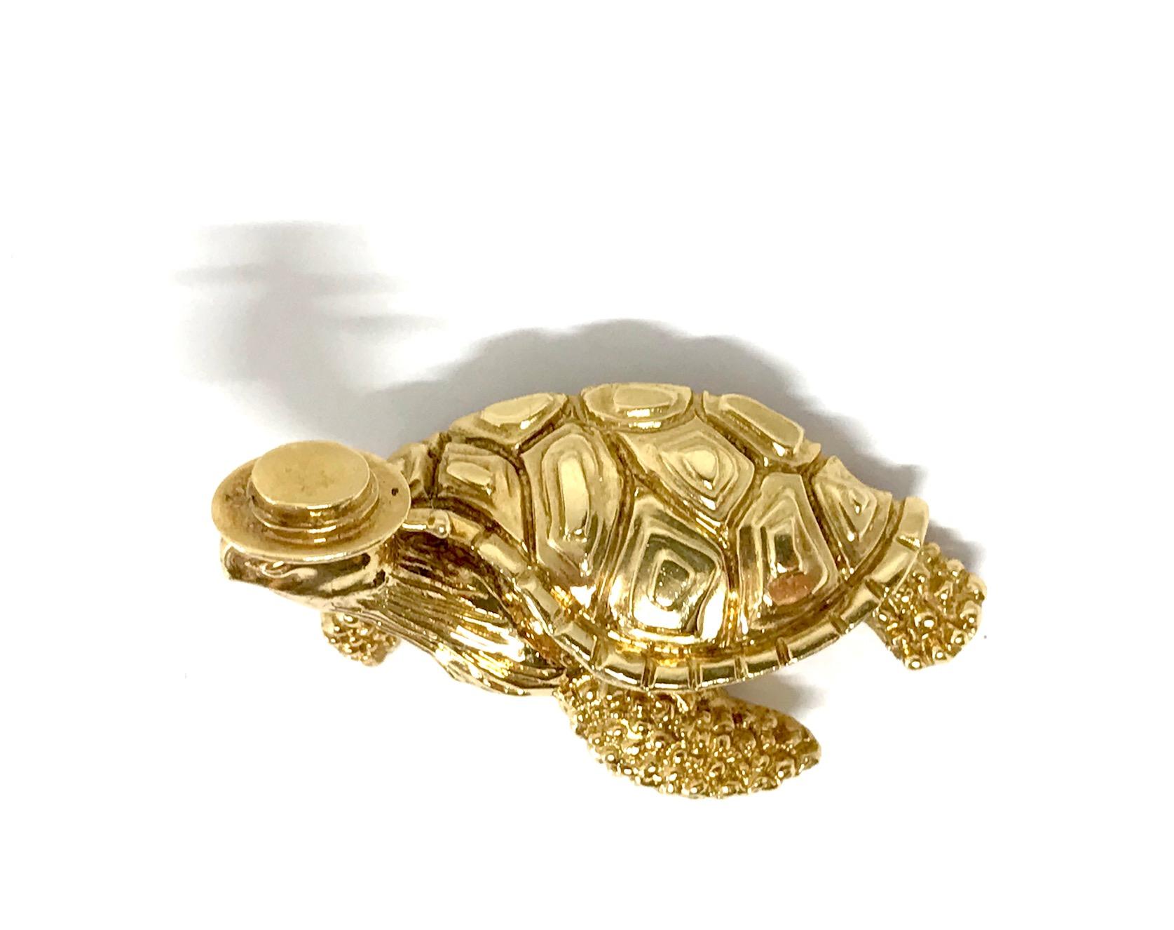 Cute yet stylish vintage Tiffany&Co 18k hammered yellow gold Sea Turtle brooch. Stamped with the Tiffany&Co maker's mark and a hallmark for 18k gold.
Measurements: 1 