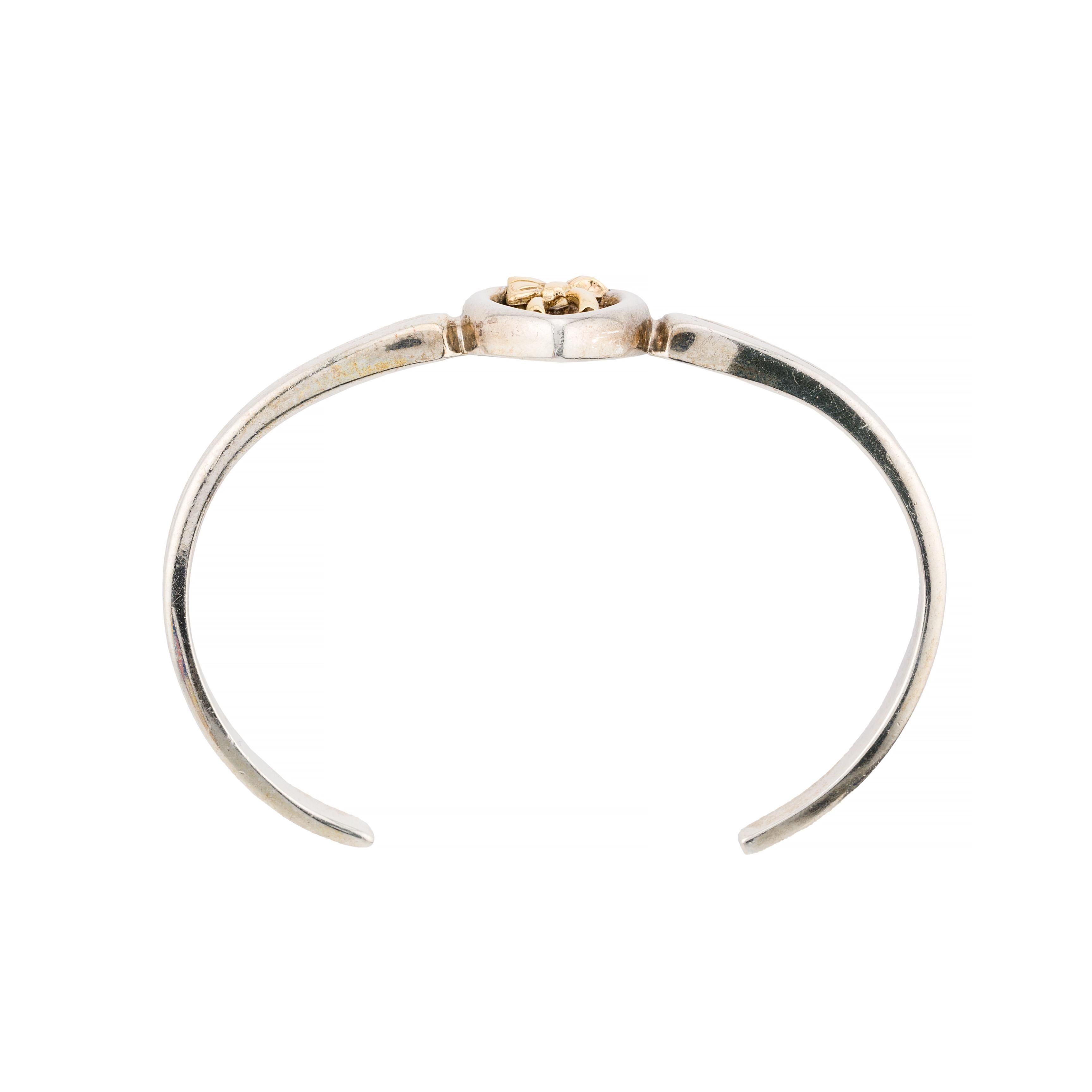 Tiffany & Co Vintage Heart, Bow Motif 18 Karat Gold, Sterling Silver Cuff In Excellent Condition For Sale In Boston, MA