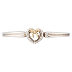 Tiffany & Co manchette vintage en or 18 carats et argent sterling à motif de cœurs et nœuds