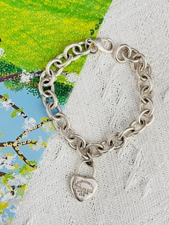Pulsera unisex vintage icónica de Tiffany & Co. en plata con el cierre «Please Return To Heart»