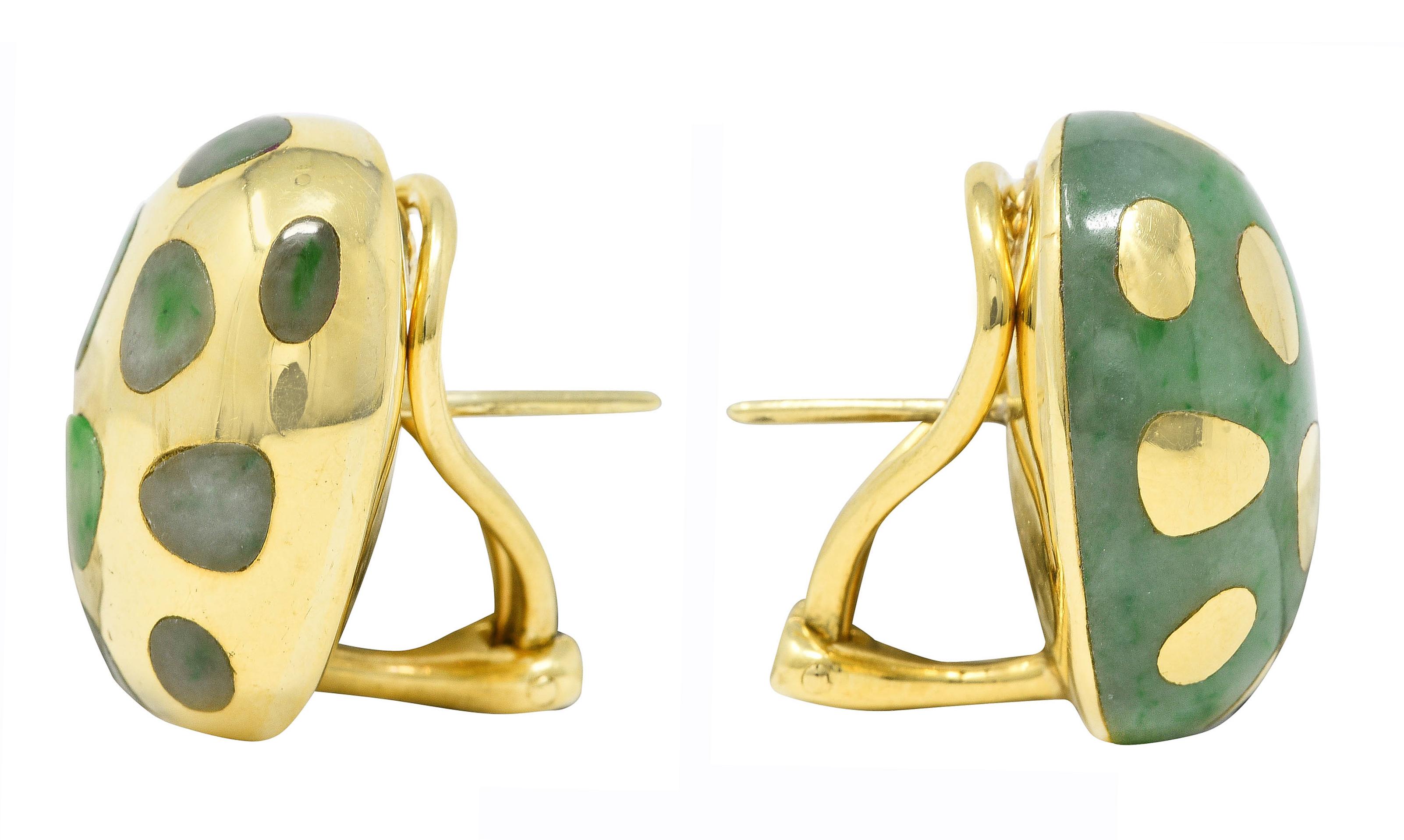 Earrings are designed as oval forms - one made of jade and the other made of gold

With a contrasting spot pattern of either jade or gold inlaid throughout

Jade is opaque pastel green with bright green mottling

With high polished gold