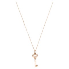 Tiffany & Co. Vintage Oval Key Diamond 18K Rose Gold Pendant Necklace