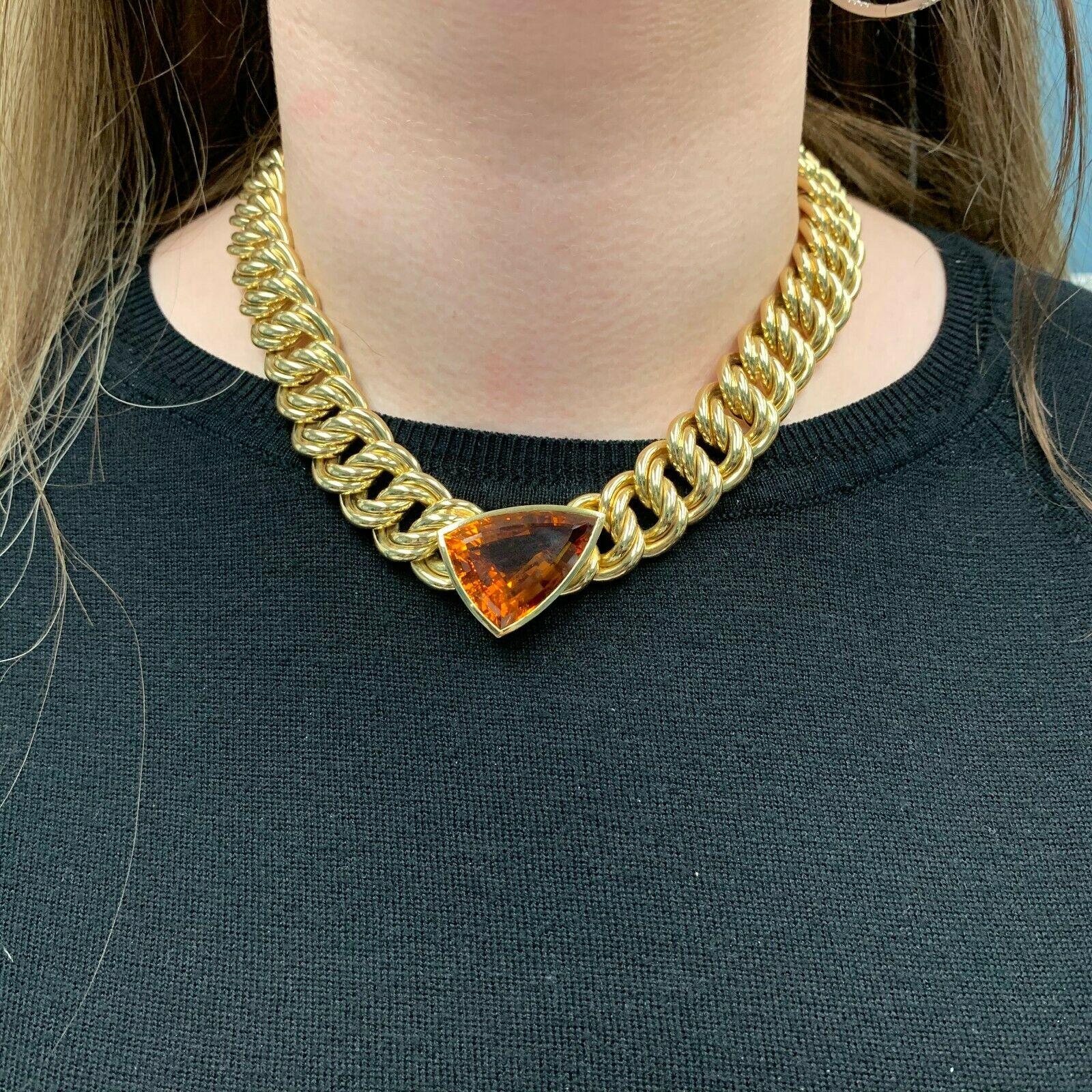 The necklace is 18 inches in length, made of 18K yellow gold, and weighs 90.90 DWT (approx. 141.37 grams). It also has one trillion cut citrine. Circa 1987