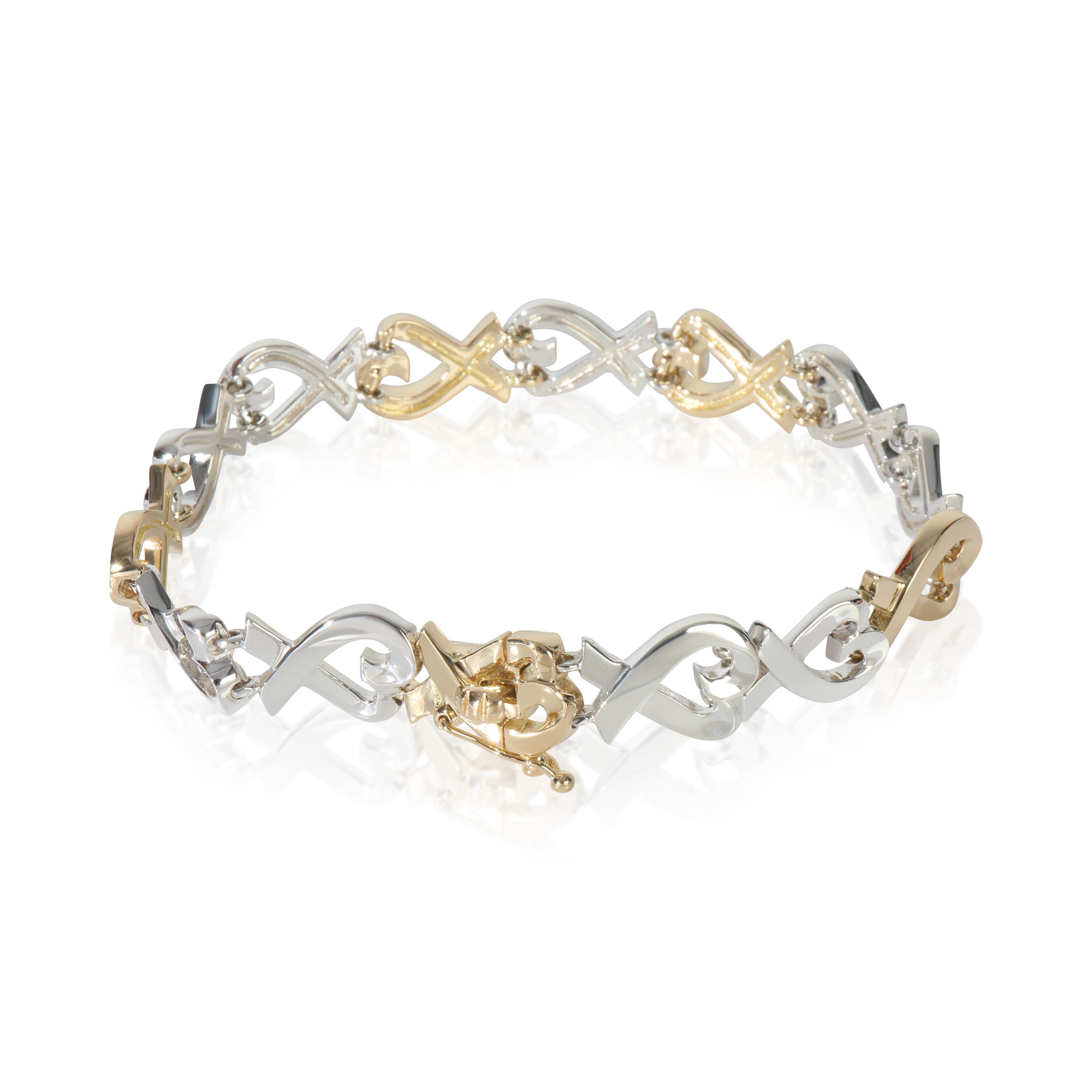 Tiffany & Co. Or jaune et argent sterling  Vintage Paloma Picasso Loving Heart Bracelet

DÉTAILS PRIMAIRES
SKU : 149731
Titre de la liste : Tiffany & Co. Or jaune et argent sterling  Vintage Paloma Picasso Coeur d'amour
Description de l'état : Fille