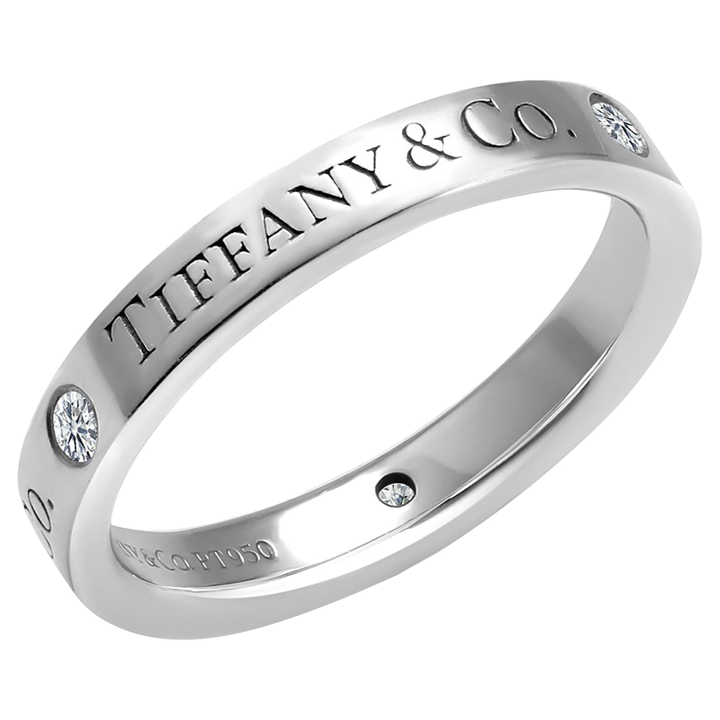 Tiffany Co, bracelet vintage en platine avec diamant 0,15 carat n° 85, taille de doigt 5  en vente